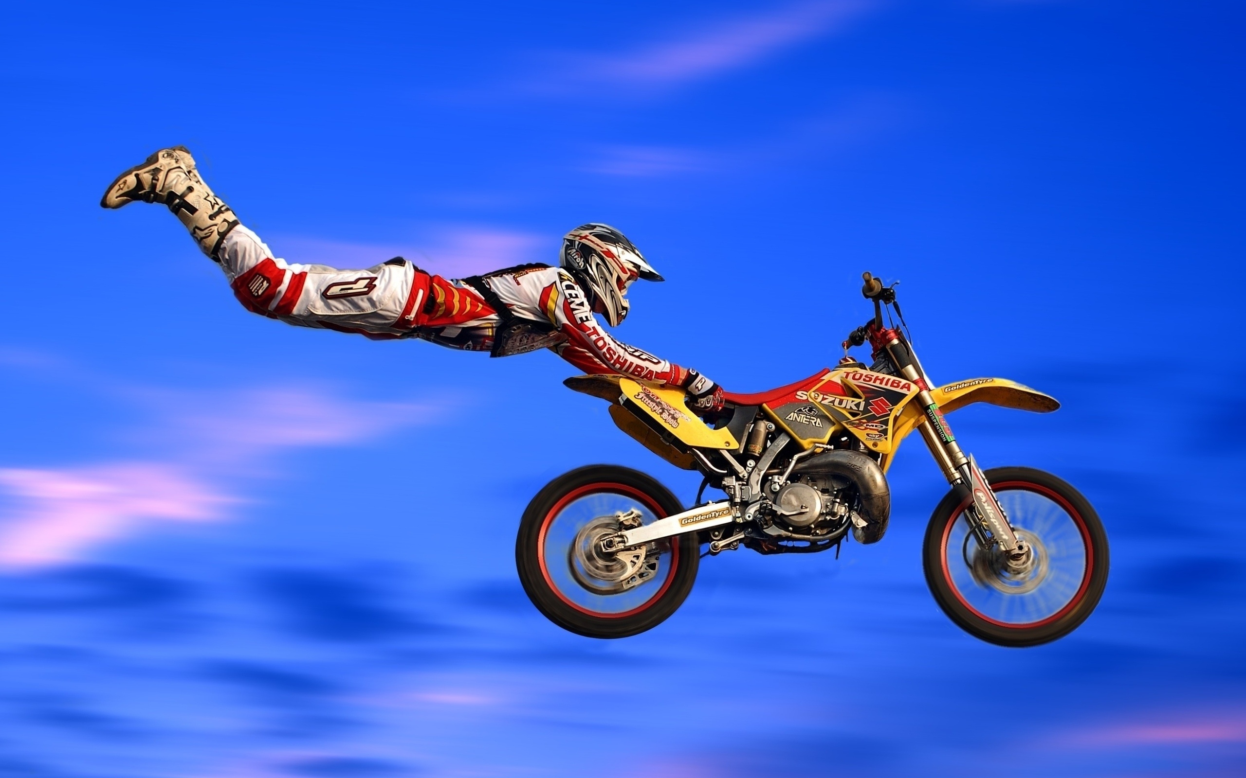 Stunt: Motocross, Acrobatic maneuvering of the motorcycle and the stuntman in the air. 2560x1600 HD Wallpaper.