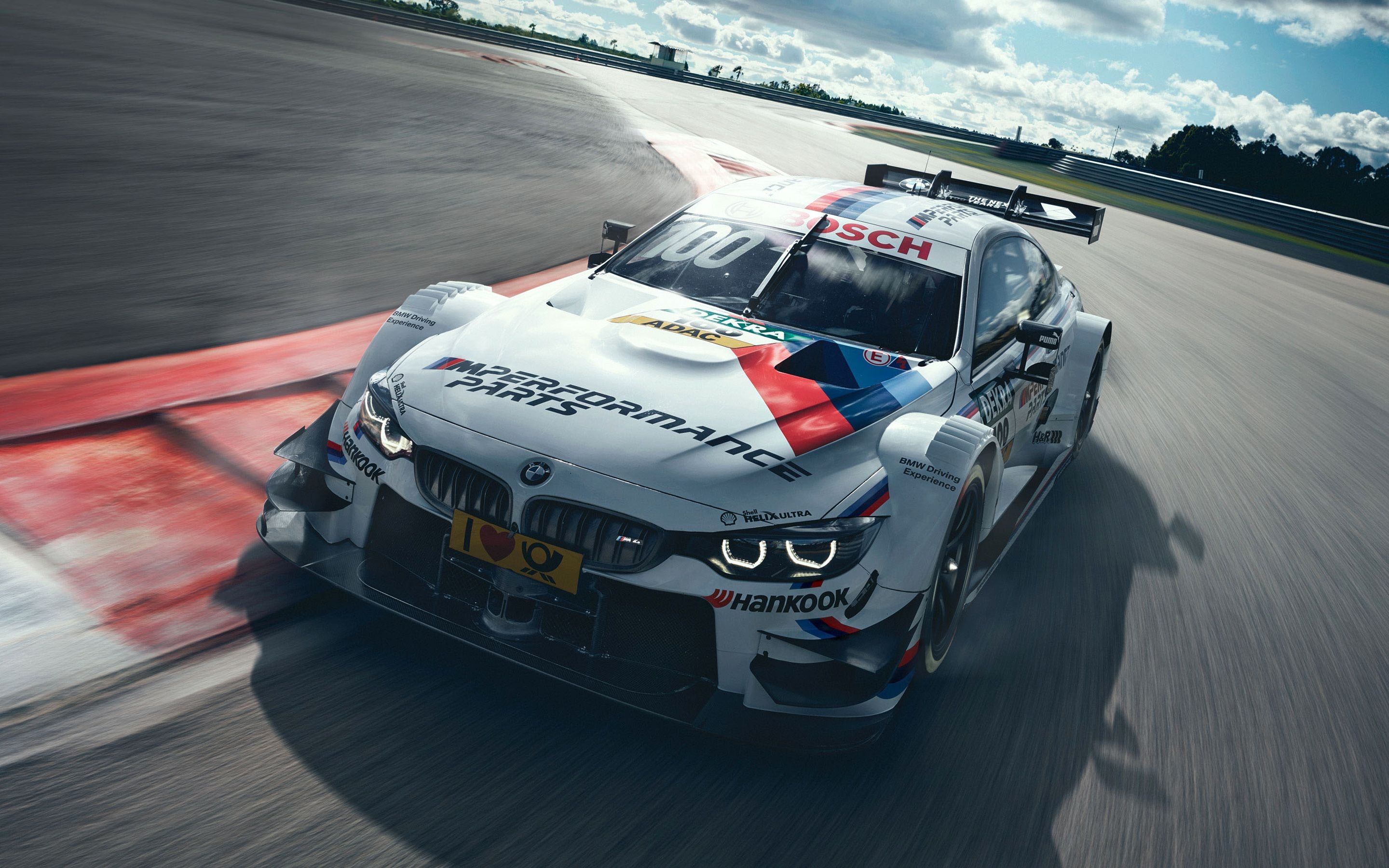 Motorsports: White BMW M4, Hankook Tires, High-performance car, Extreme turn on the track. 2880x1800 HD Background.