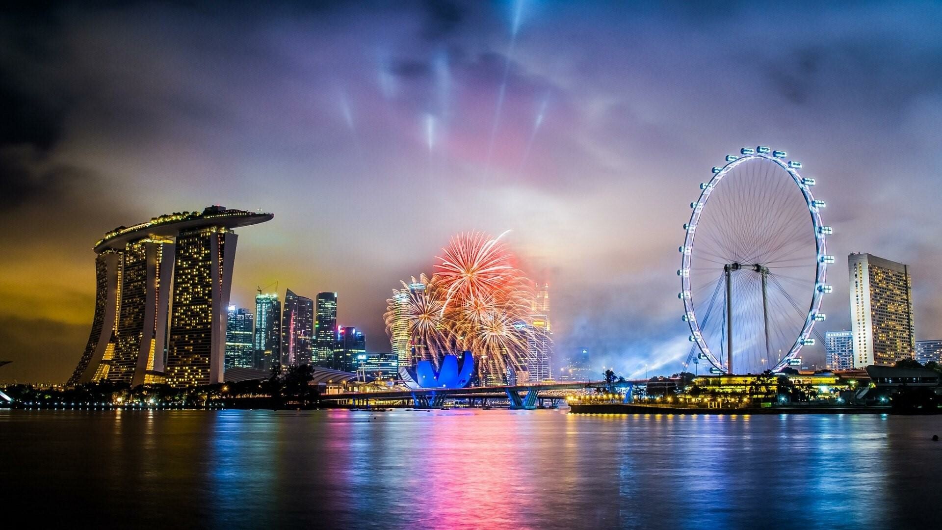 Singapore: Marina Bay, surrounded by the Downtown Core, Marina East, Marina South and Straits View. 1920x1080 Full HD Background.