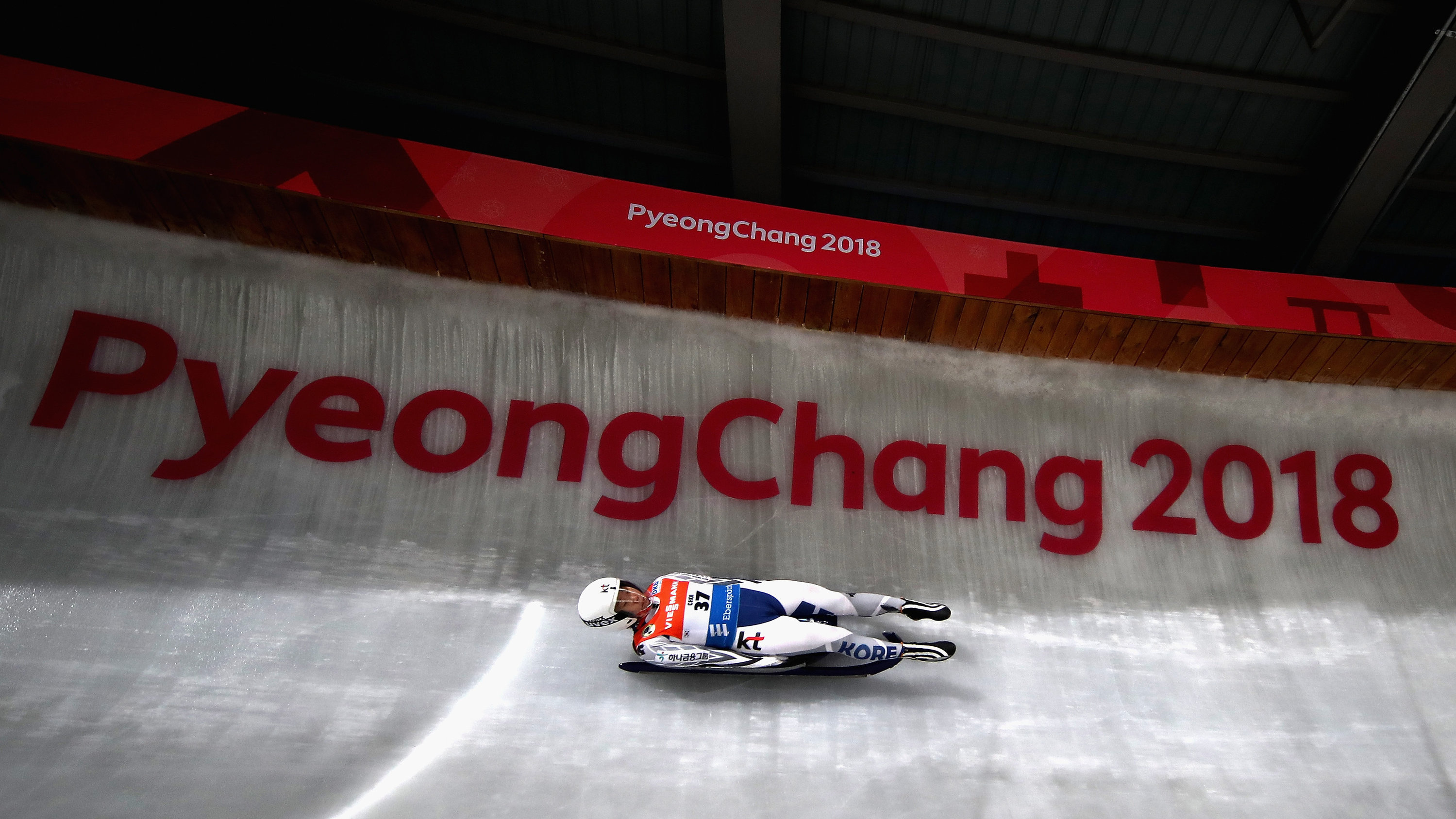 Luge: A luger slides down the track at the 2018 PyeongChang Winter Olympics. 3000x1690 HD Background.