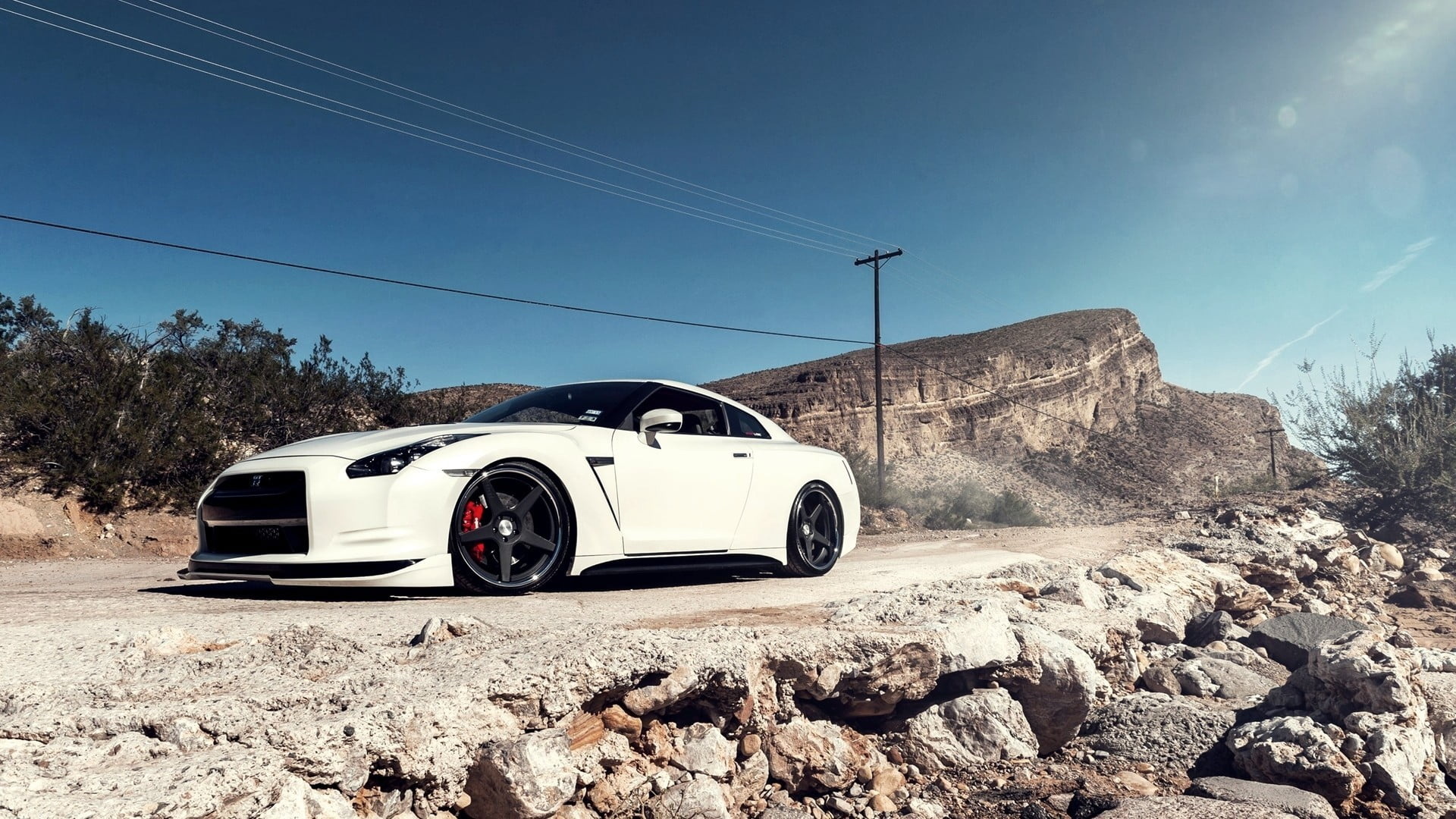Nissan GT-R sports car, Iconic white color, Skyline heritage, Exhilarating driving experience, 1920x1080 Full HD Desktop