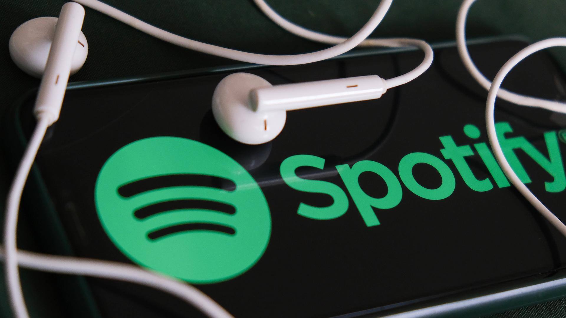 Spotify: A digital music, podcast, and video service, Millions of songs and podcasts for free. 1920x1080 Full HD Background.