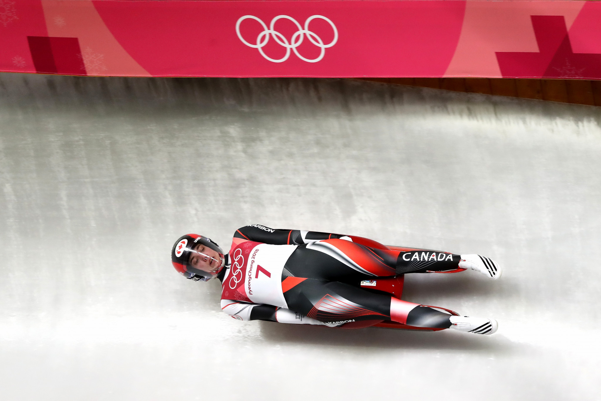 Luge: A Canadian luger competes at the 2018 PyeongChang Winter Olympic Games. 2050x1370 HD Background.