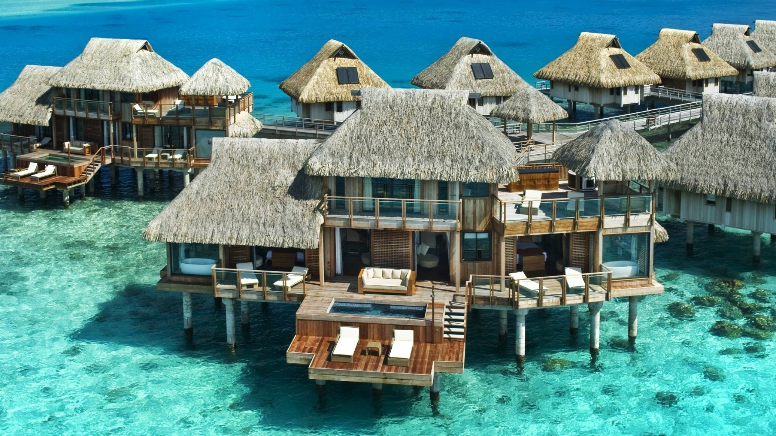 Bora Bora: Luxury resort above the water, Tropical islands for beach vacation. 2560x1440 HD Wallpaper.