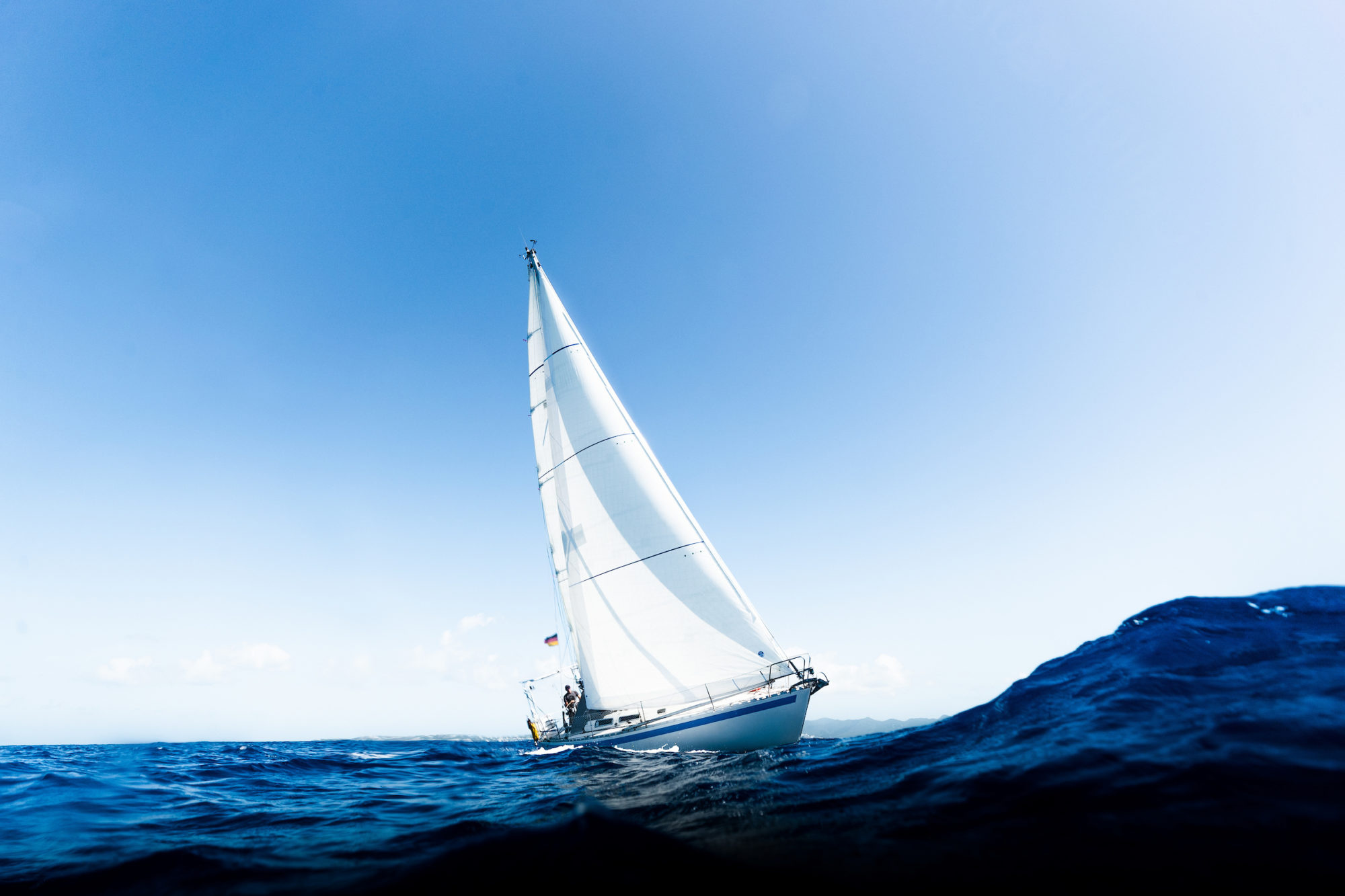 Skiff: A boat, A cruising sail, North Sails, An international sailmaker. 2000x1340 HD Background.