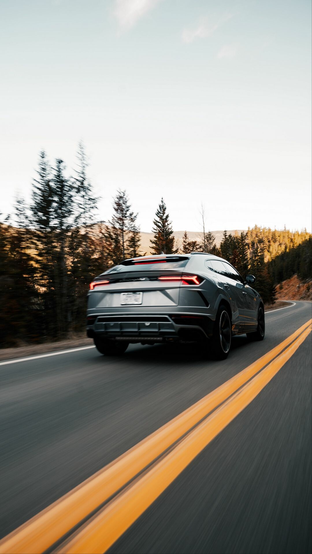 Lamborghini: The company produces the Urus SUV, powered by a twin-turbo V8 engine. 1080x1920 Full HD Background.