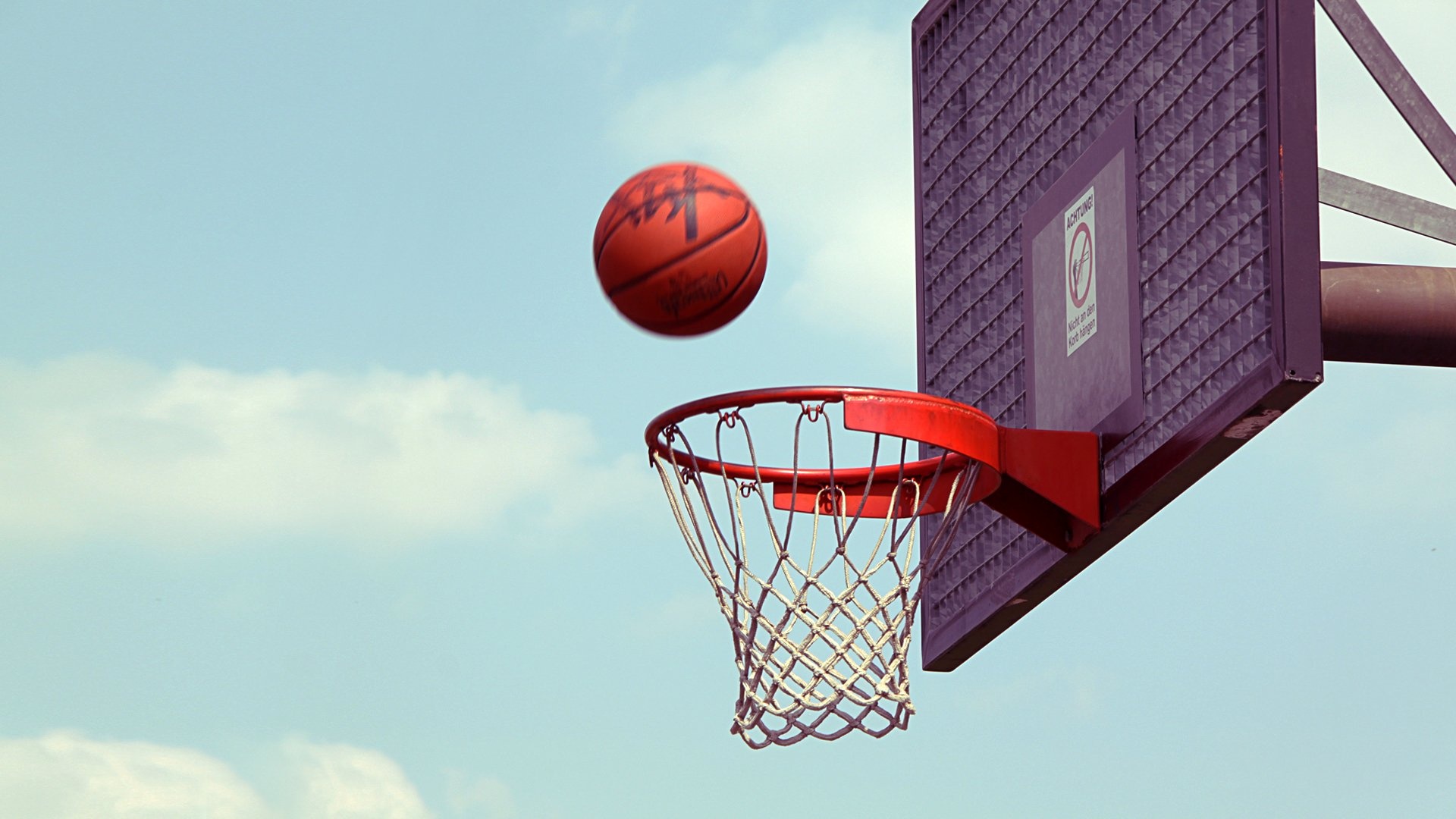 Streetball: Basketball basket and a ball, Urban sports played on asphalt. 1920x1080 Full HD Background.
