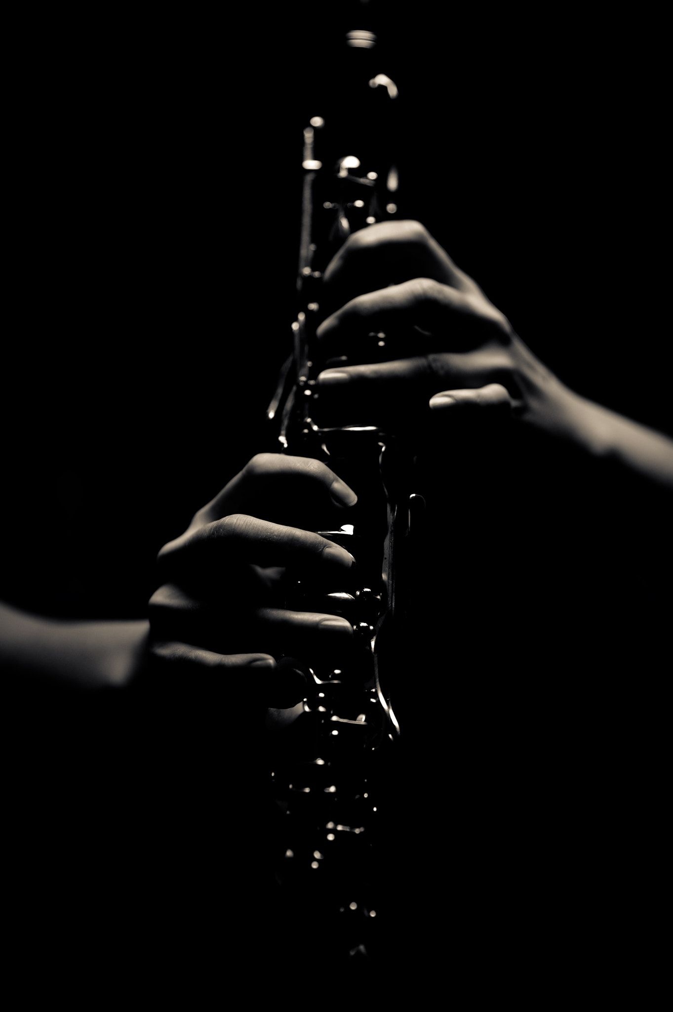 Clarinet: 17 metal keys, The tone holes spread down the middle of the upper and lower joints, Playing technique. 1370x2050 HD Background.