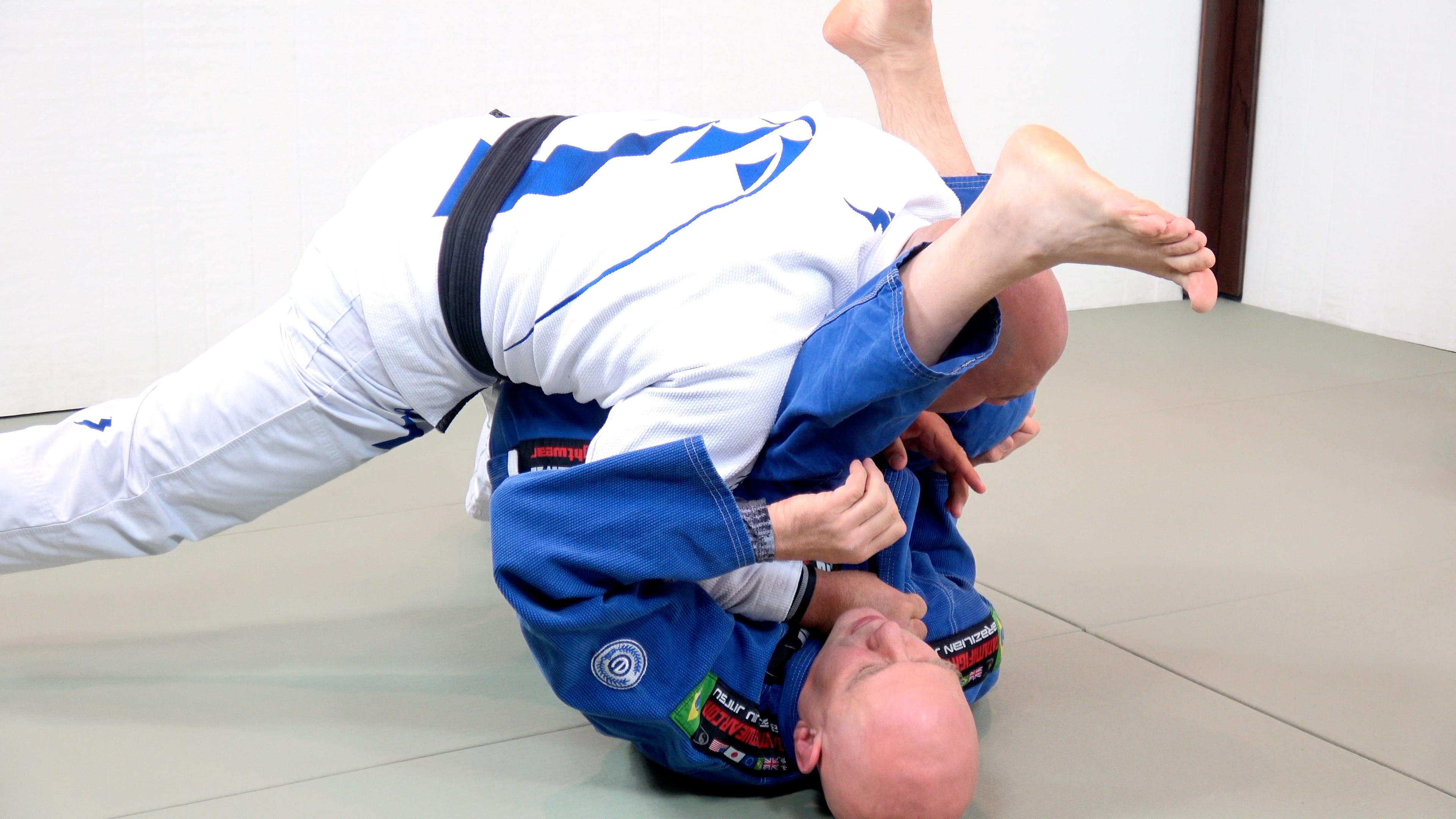 Brazilian Jiu-jitsu: Ground fighting (ne-waza) and submission holds, Taking an opponent to the ground. 3840x2160 4K Wallpaper.