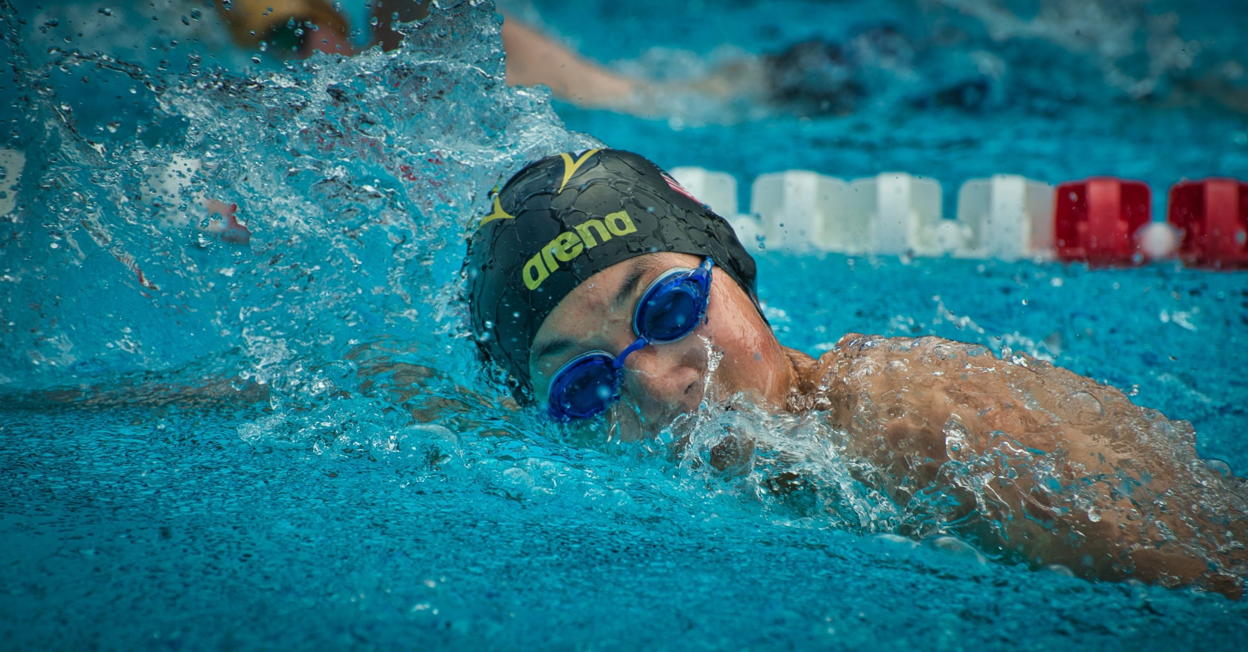 Swimming: A competitive front crawl women's event, Water sports and recreation. 2560x1340 HD Background.