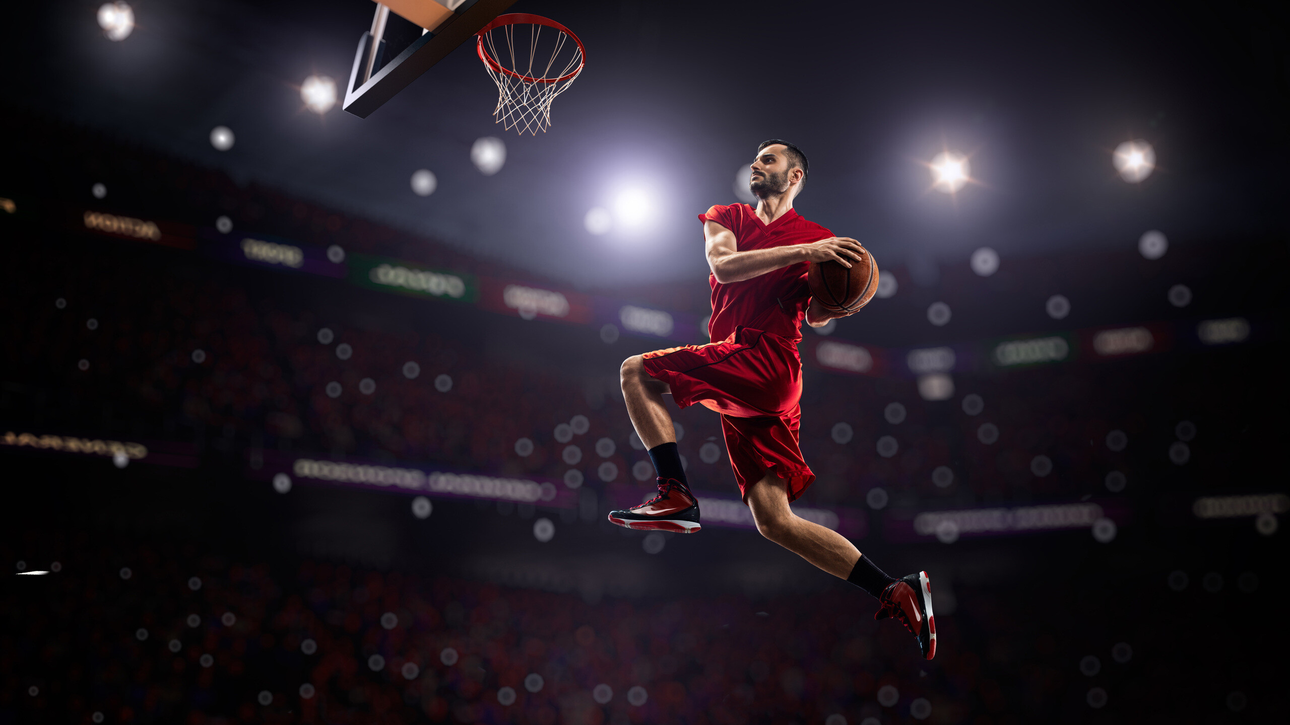 Goal (Sports): Basketball player in action, Shooting a basketball through the hoop. 2560x1440 HD Background.