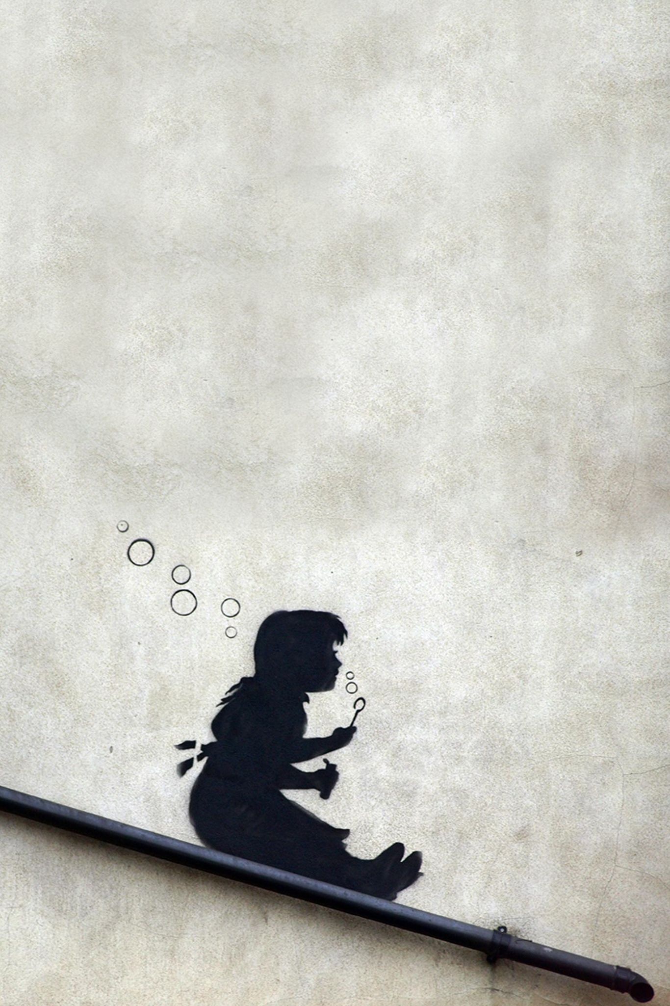 Banksy: Bubble Slide Girl, The wall of a Youth Club in Hackney, East London. 1370x2050 HD Background.
