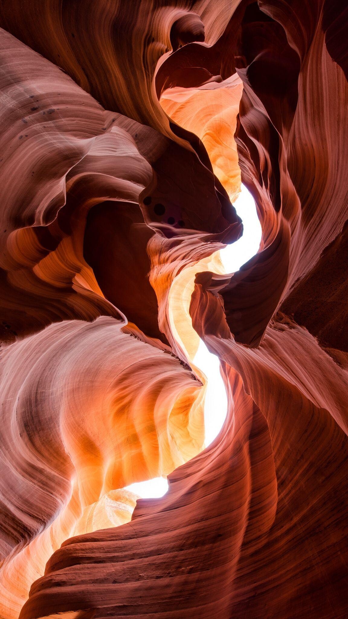 Geology: Antelope Canyon, A deep cleft between escarpments or cliffs. 1160x2050 HD Background.