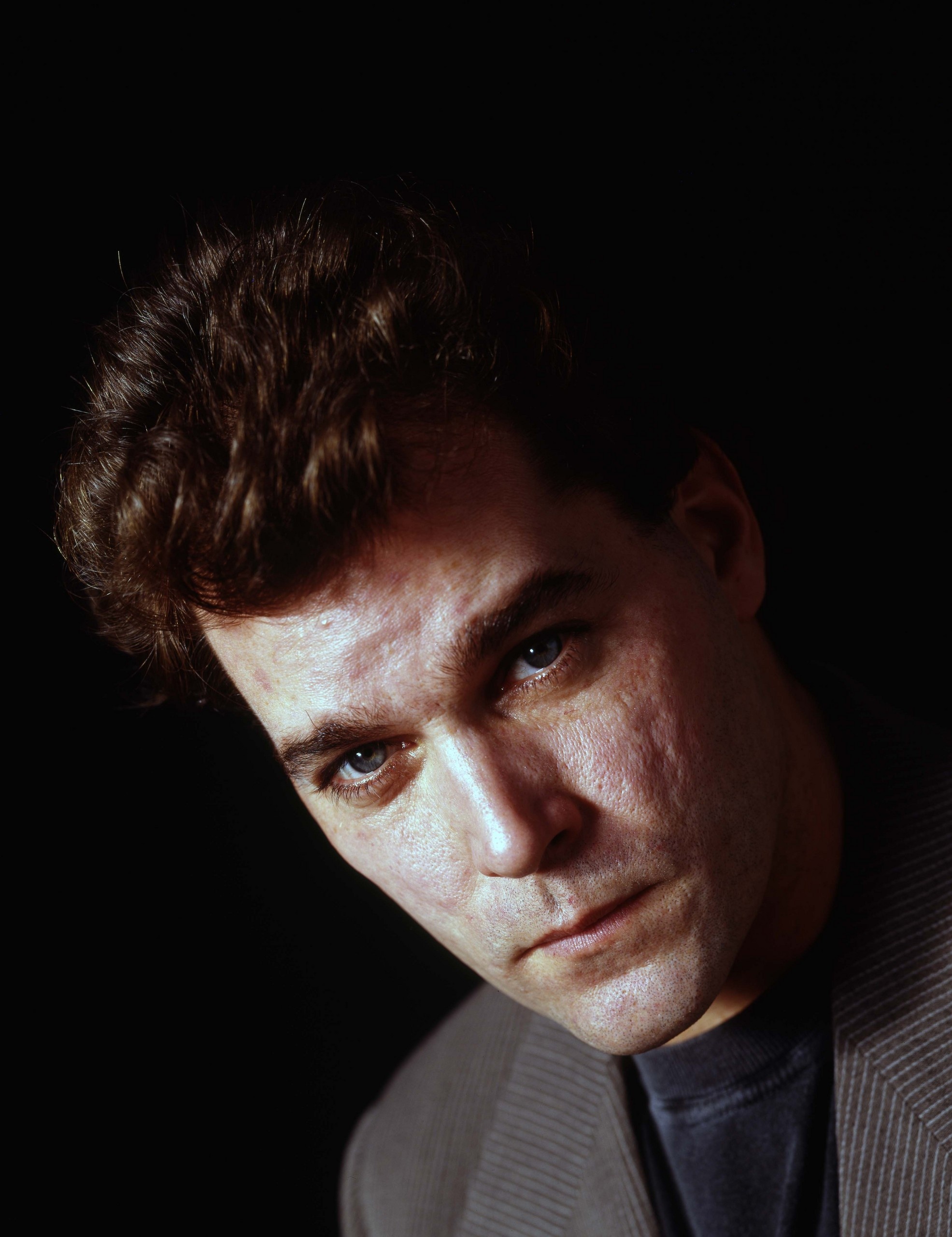 Ray Liotta: One of the earliest roles was as Joey Perrini on the soap opera Another World. 1980x2560 HD Background.