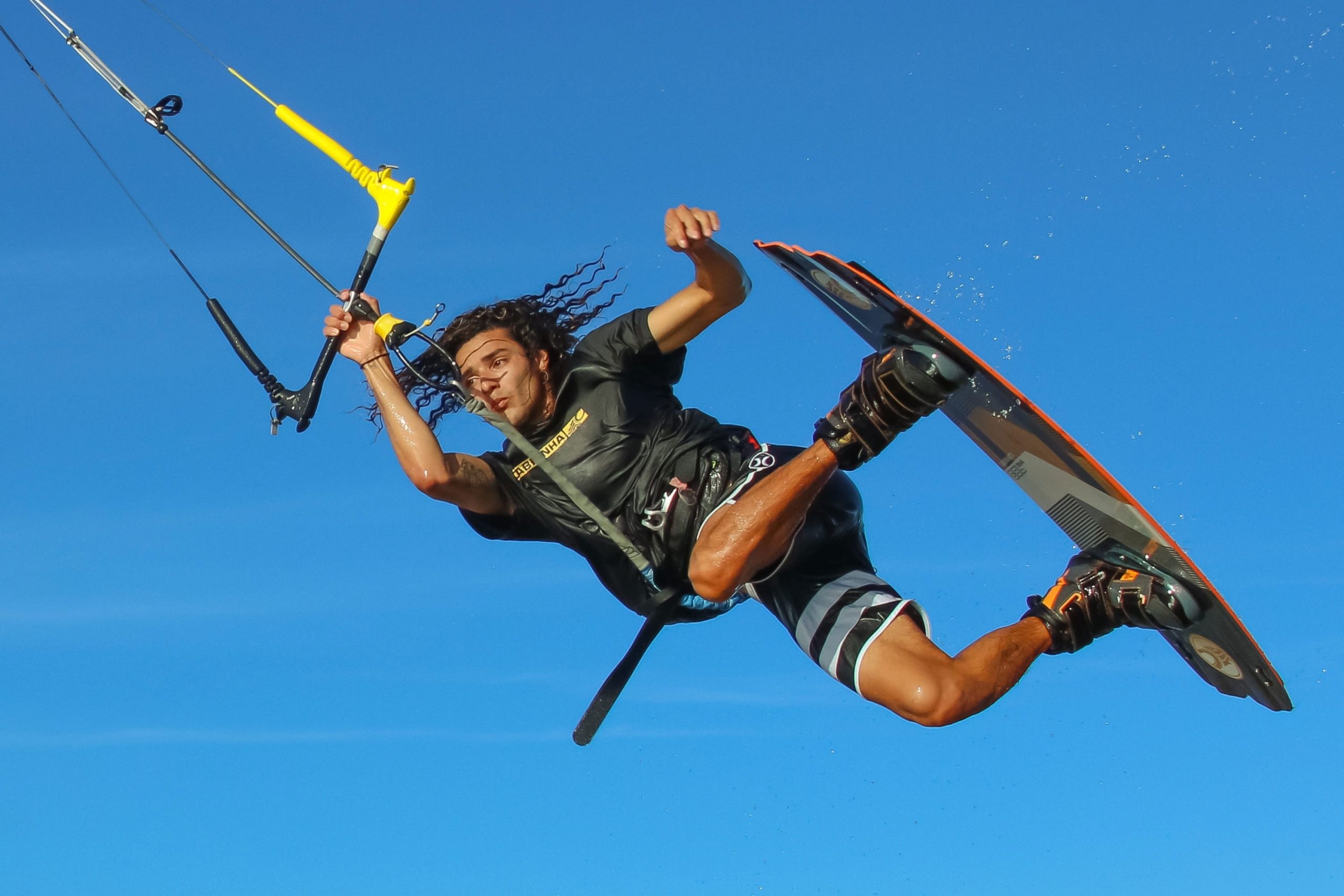 Kiteboarding: Kitesurfing, Wind, Sea, Rolls, Spins, Regular Jumps. 2560x1710 HD Background.