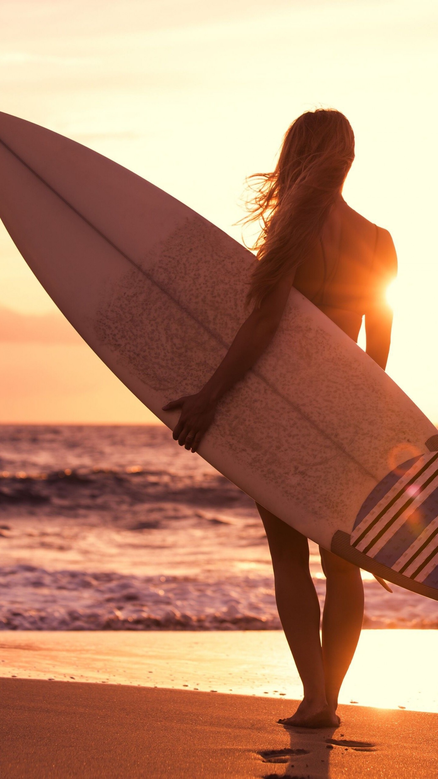 Girl Surfing: Recreational water sports in the sunset, Ocean shores water sports discipline. 1440x2560 HD Wallpaper.