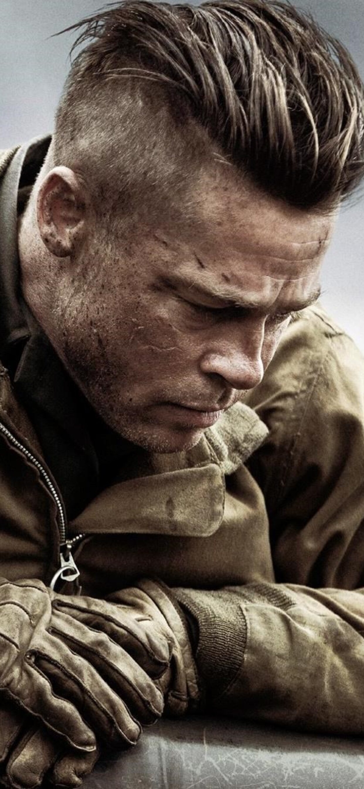 Brad Pitt: Staff Sergeant Don “Wardaddy” Collier, battle-hardened 2nd Armored Division tank commander, Fury, Movie star. 1250x2690 HD Background.