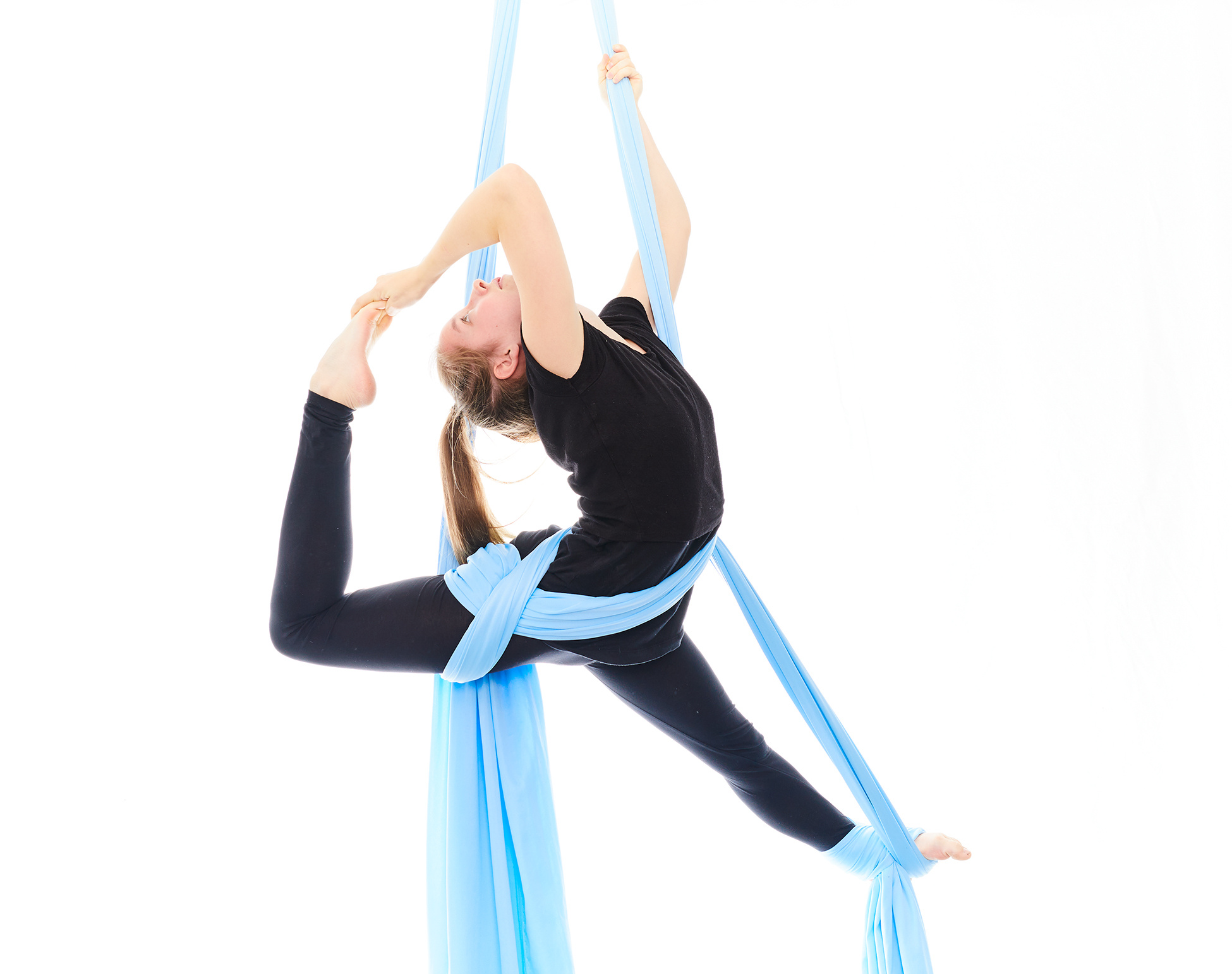Aerial Silks: A gymnast performs a stretch while hanging from a fabric. 1950x1550 HD Wallpaper.