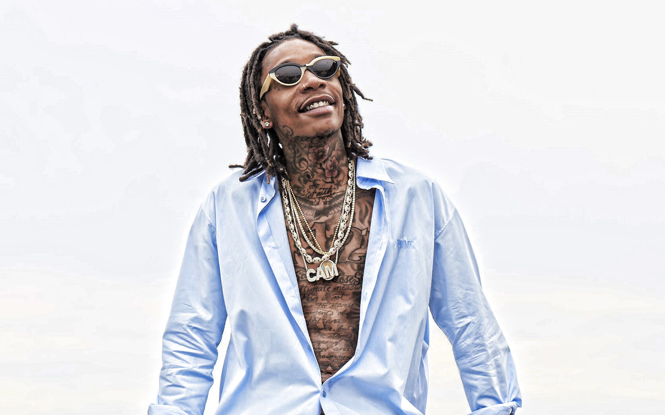 Wiz Khalifa: His single "Say Yeah" received urban radio airplay, charting on the Rhythmic Top 40 chart in 2008. 2560x1600 HD Background.