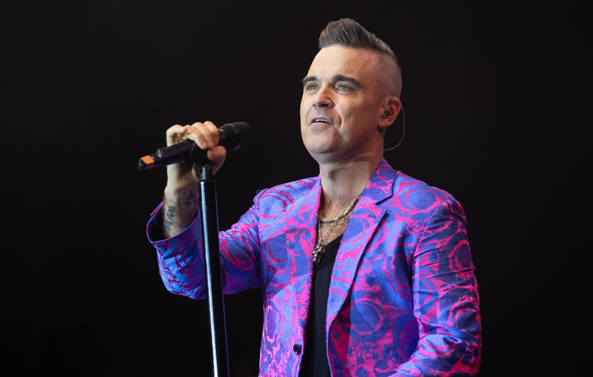 Robbie Williams, Secret vocals, Dance collaboration, Soulful sway, 2000x1270 HD Desktop
