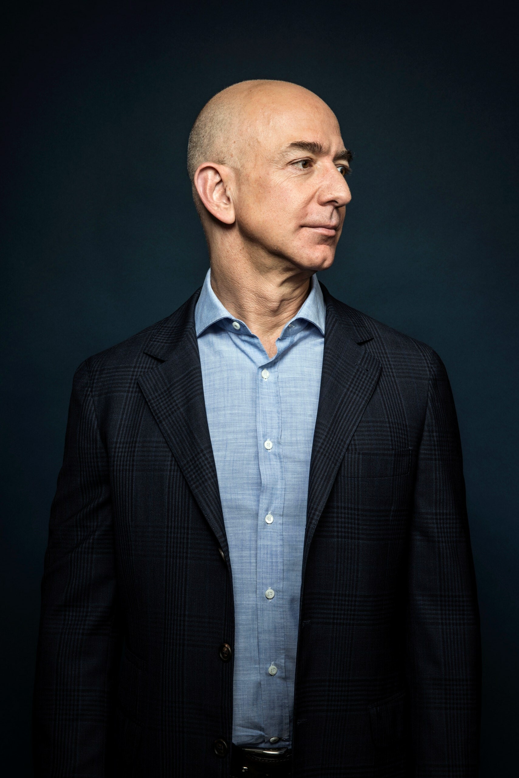 Jeff Bezos: The founder of aerospace company Blue Origin, Developes reusable rocket engines and launch vehicles designed to significantly lower the cost and increase the accessibility of space flights. 1710x2560 HD Background.