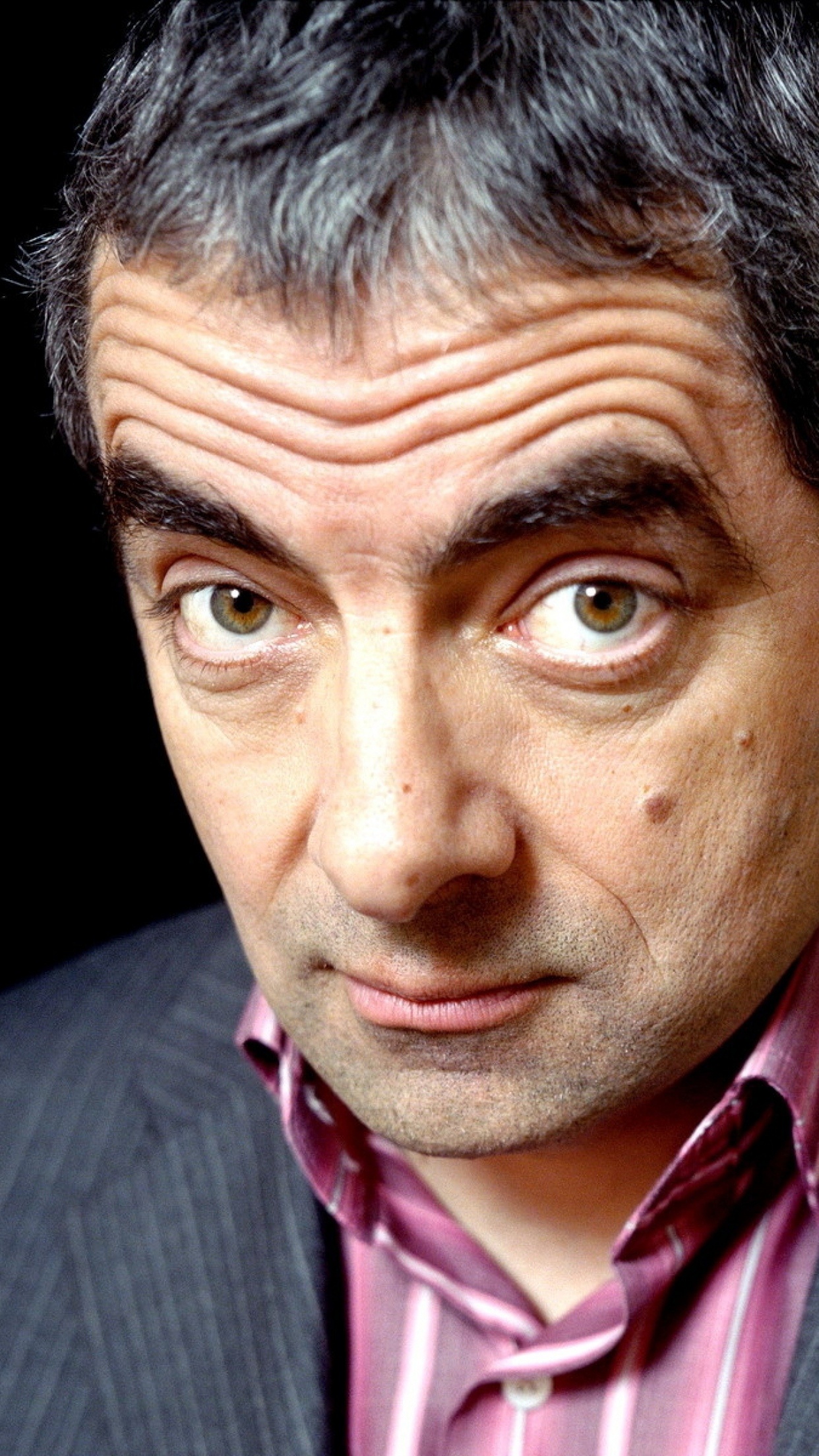 Rowan Atkinson: Actor, Comedian, Nigel Small-Fawcett in the James Bond film Never Say Never Again. 1250x2210 HD Background.