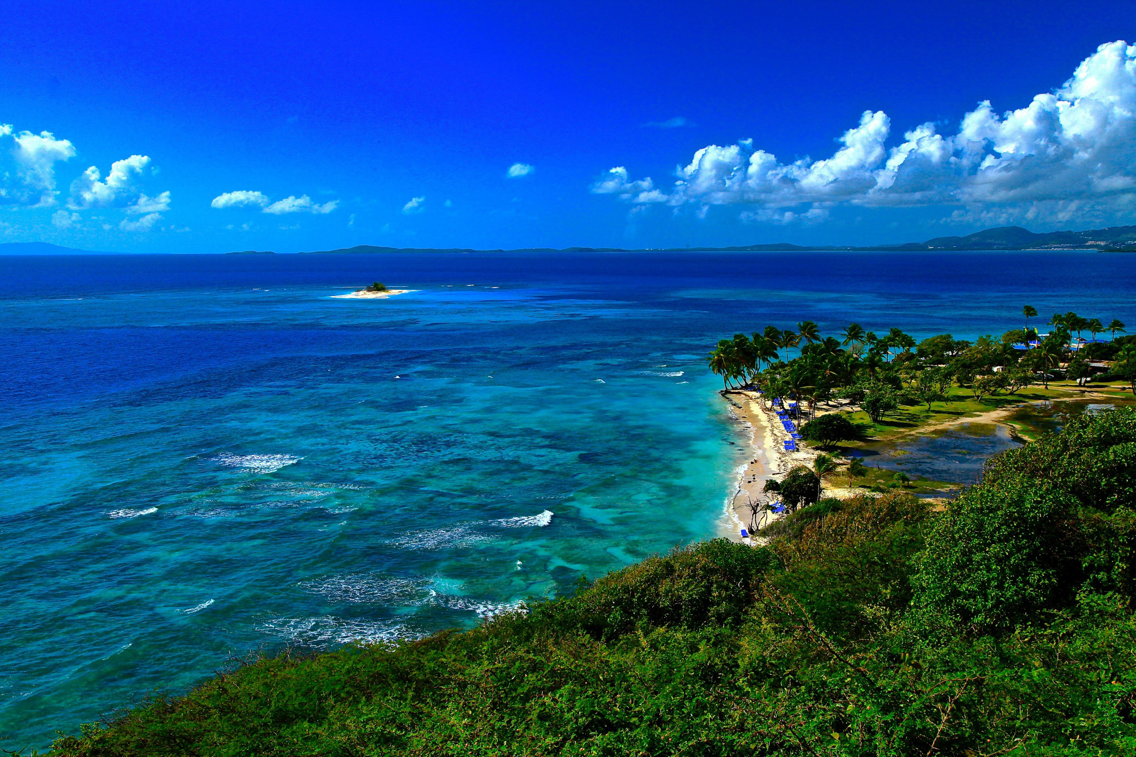 Palomino island, Shoreline view, Ocean scenery, Nature beauty, 2310x1540 HD Desktop