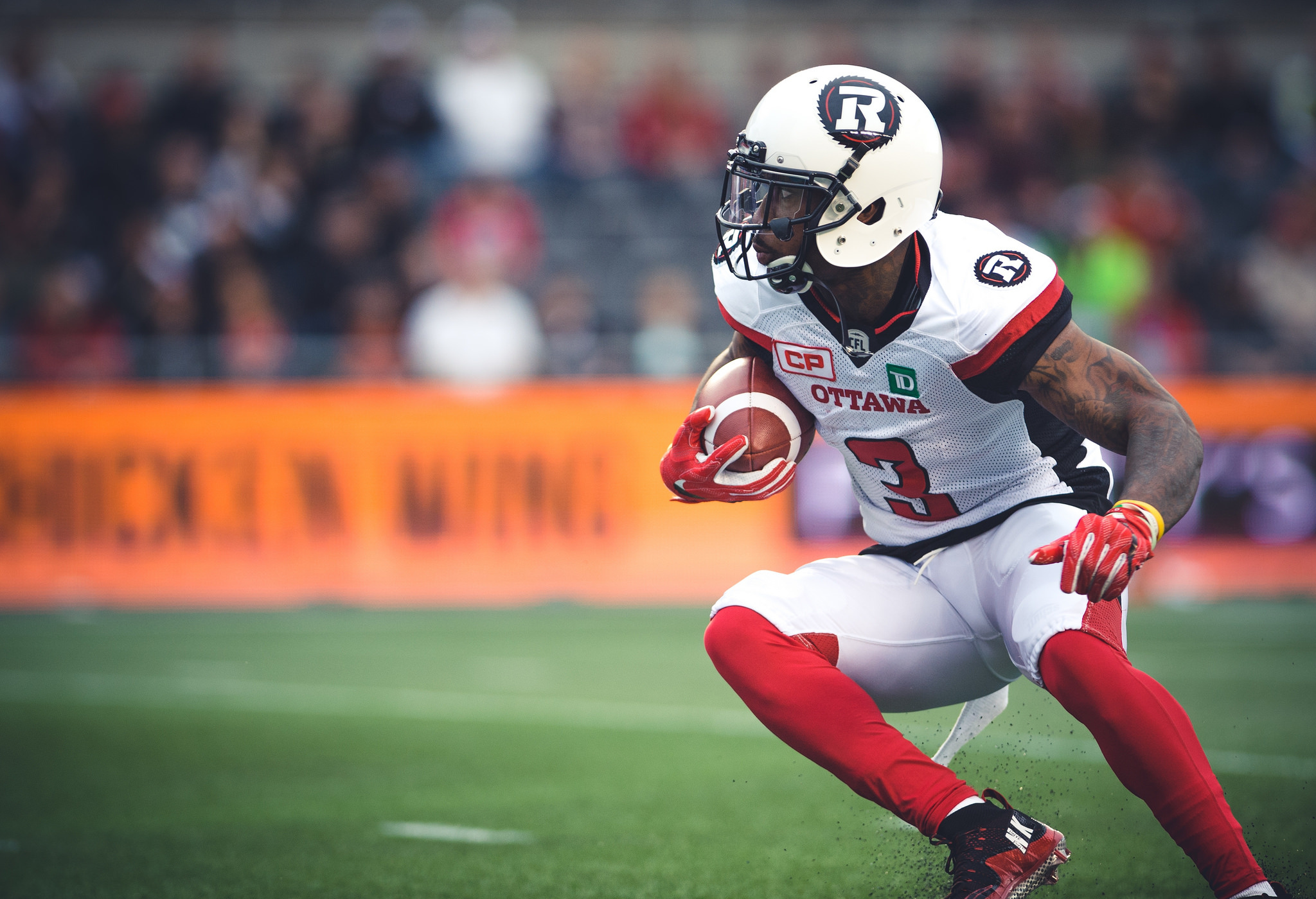 Canadian Football: The Ottawa Redblacks player with a ball, The East Division of the CFL, Canada. 2050x1400 HD Wallpaper.