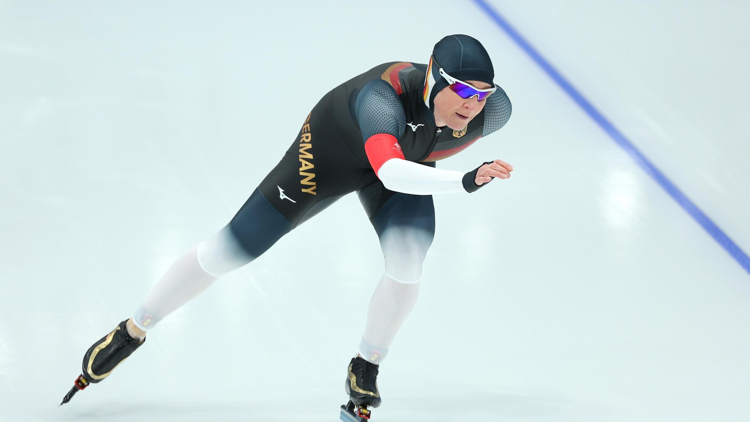 Speed Skating: Winter Olympics 2022, German speed skater, Claudia Pechstein, Five Olympic gold medals. 2560x1440 HD Background.