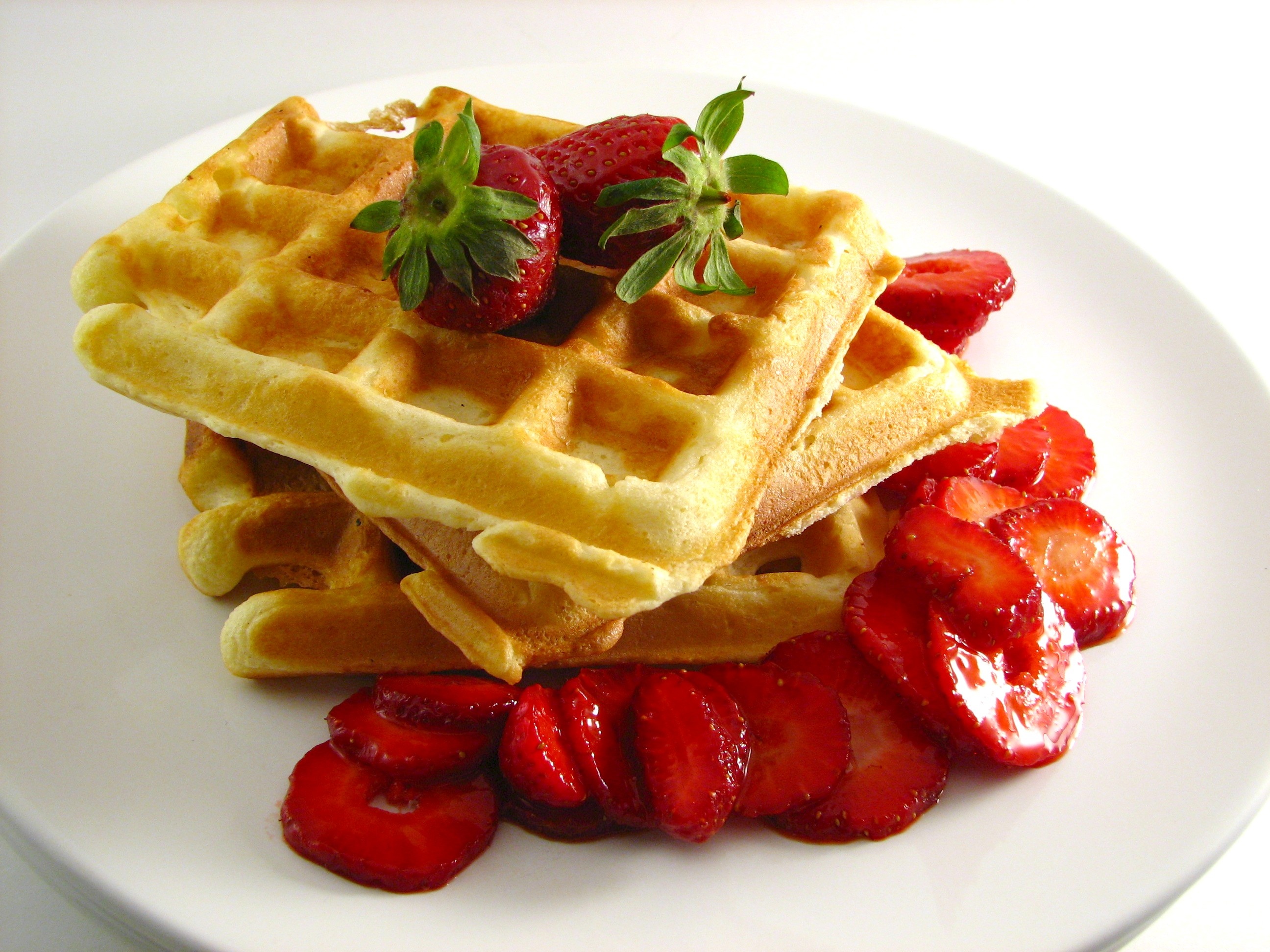 Waffle: Served as a sweet breakfast food, topped with strawberries. 2600x1950 HD Background.