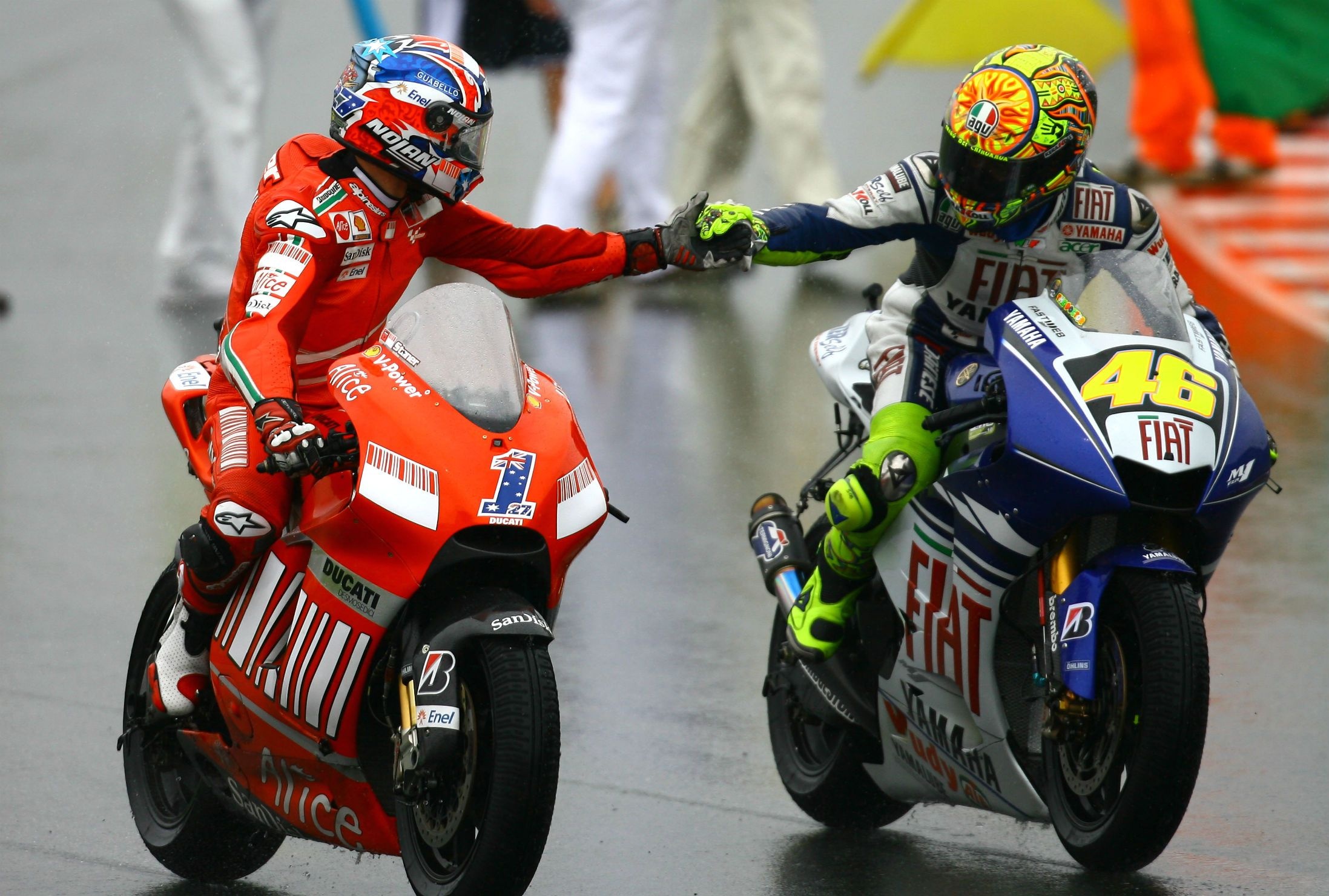 Motorcycle Racing: Rossi vs Casey Stoner, The Doctor, Ducati and Yamaha, 2012. 2200x1480 HD Wallpaper.