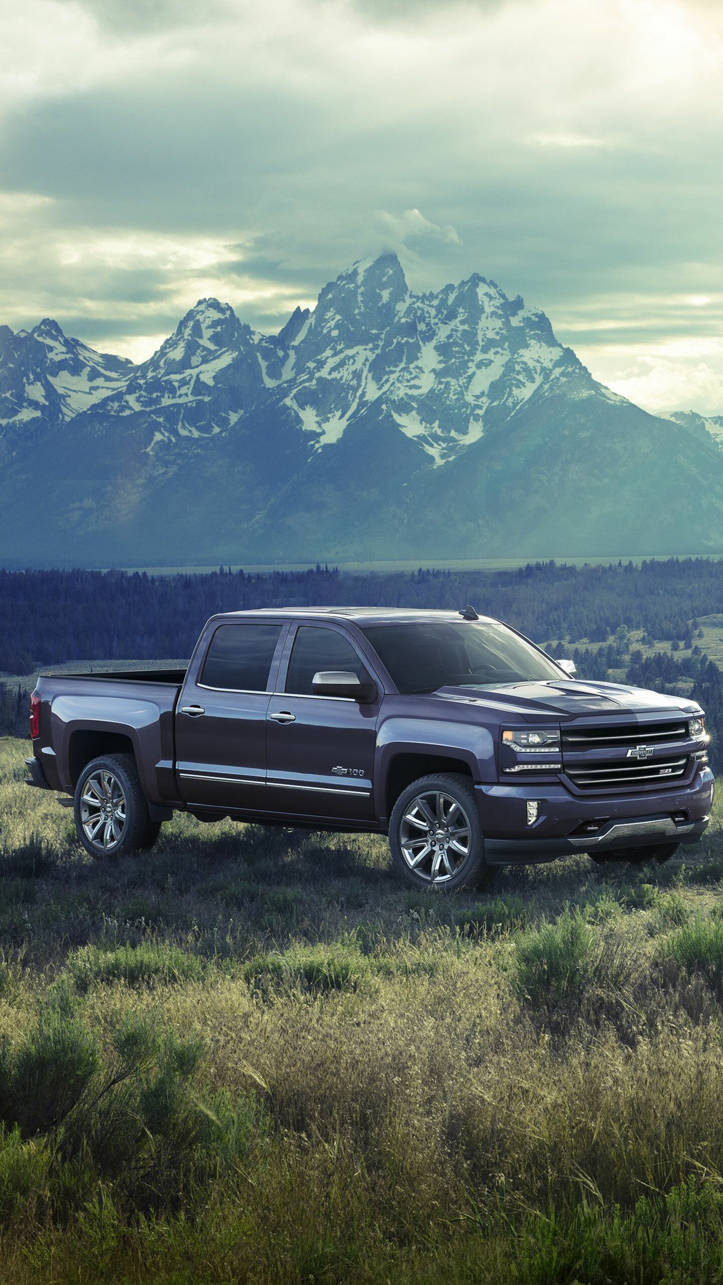 Chevrolet: Chevy trucks are known for their tough towing capacity and payloads, alongside other perks like excellent driving performance and sporty exterior styling. 1440x2560 HD Background.