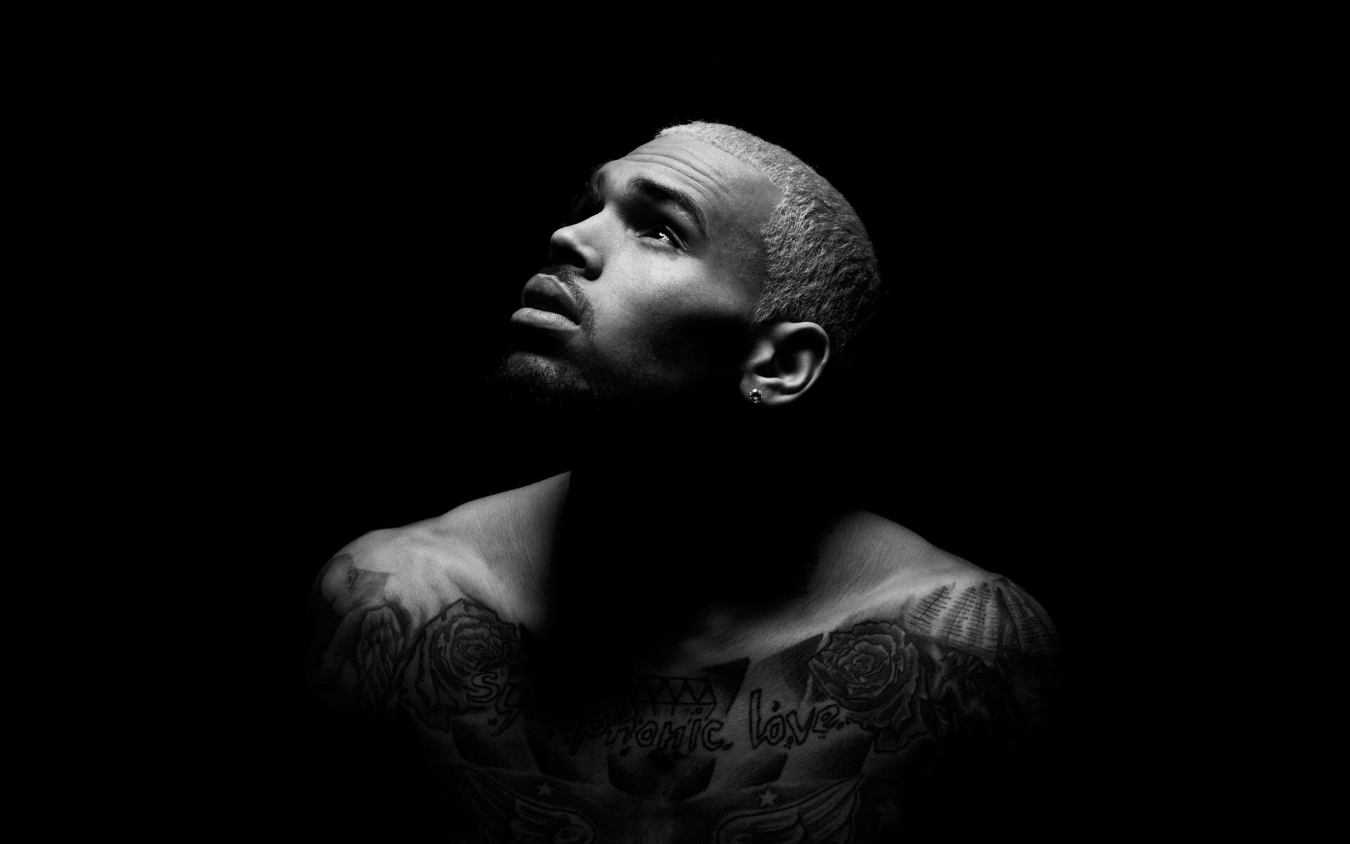 Chris Brown: An American R&B, hip-hop, and pop singer who began his career at the age of 16. 1920x1200 HD Background.