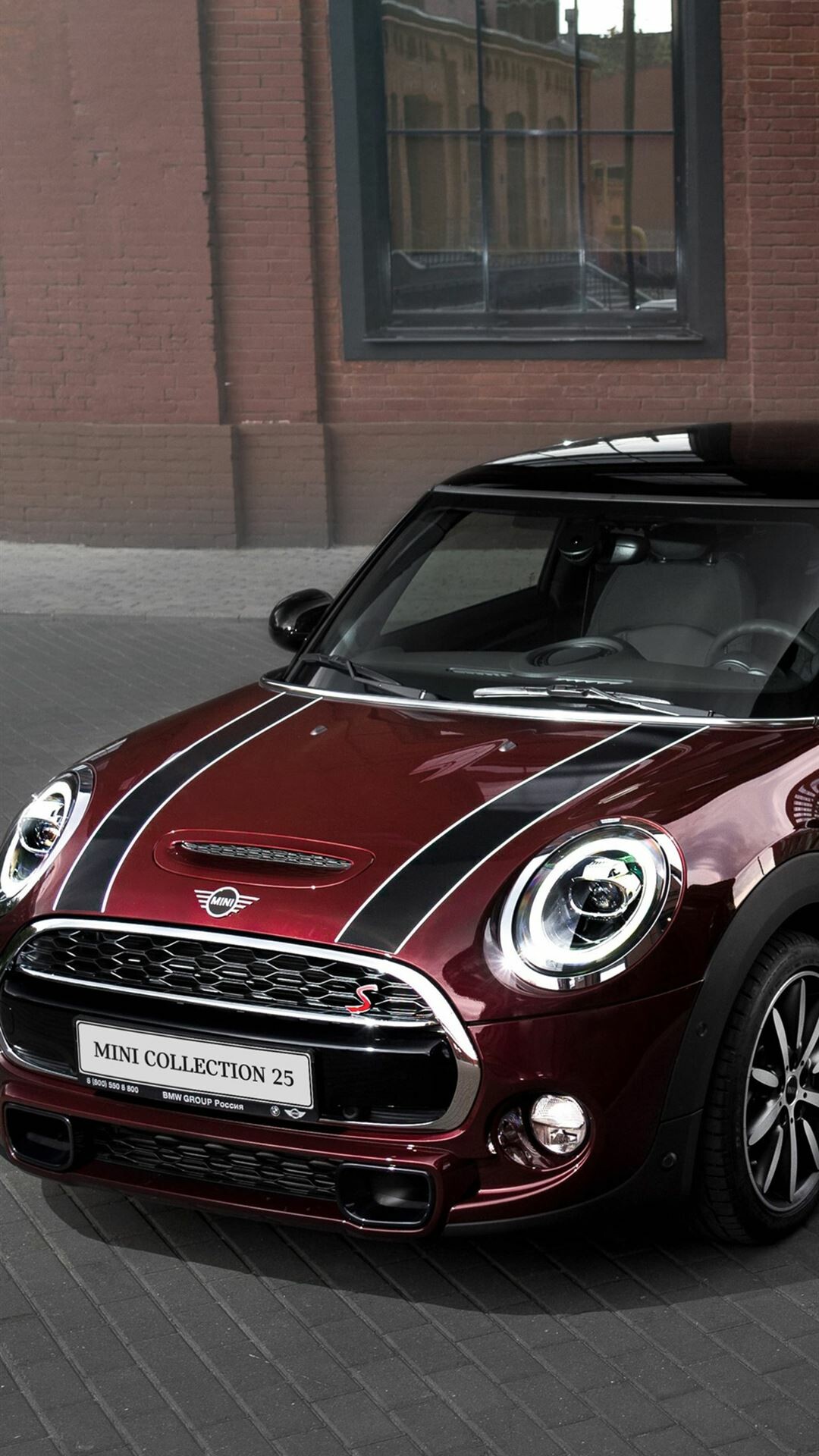 MINI Cooper: Countryman became the first five-door model to be launched in the BMW-era. 1080x1920 Full HD Wallpaper.