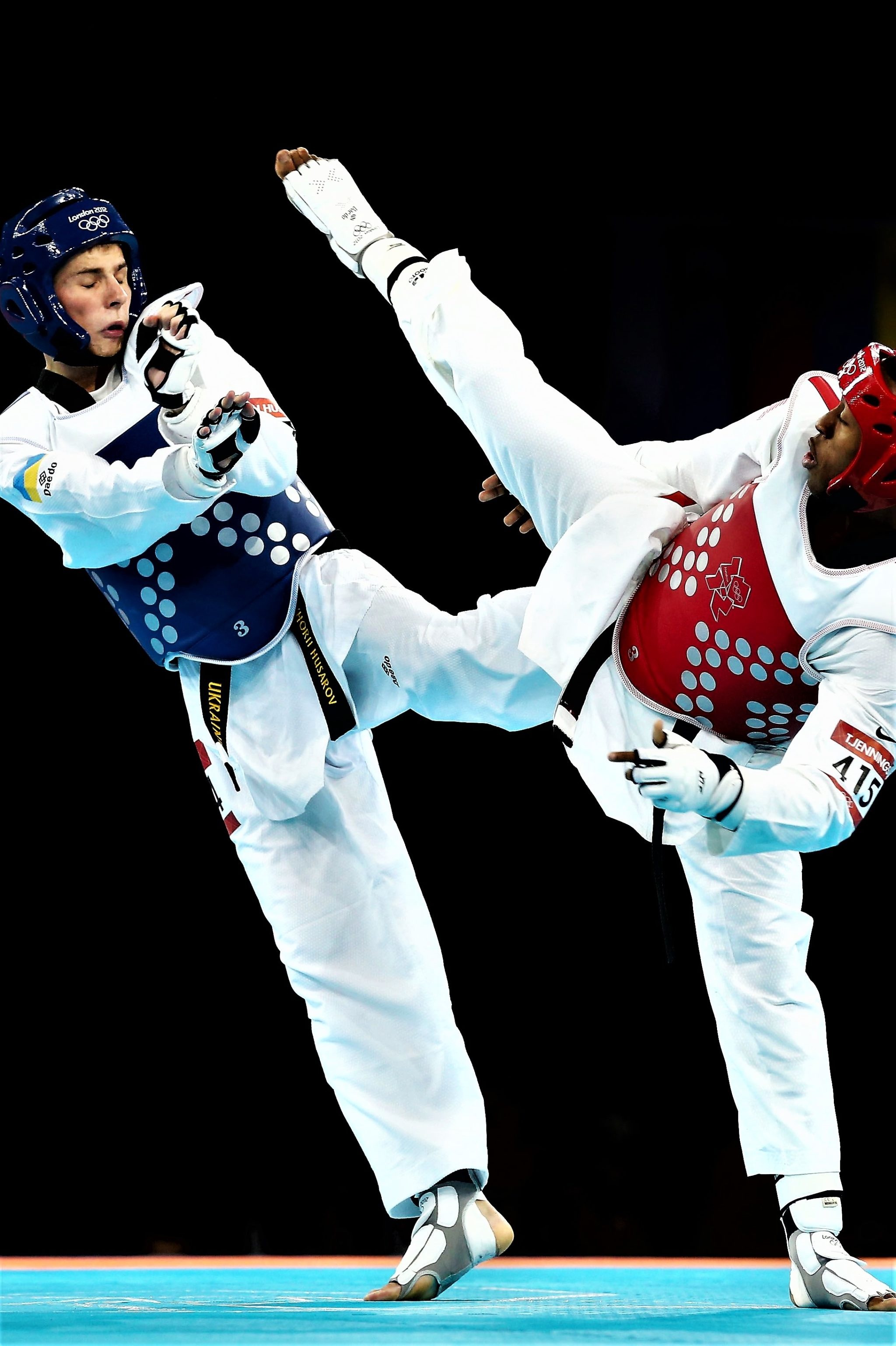Taekwondo: Terrence Jennings vs. Hryhorii Husarov, The 2012 Olympic Games in London. 2050x3080 HD Wallpaper.