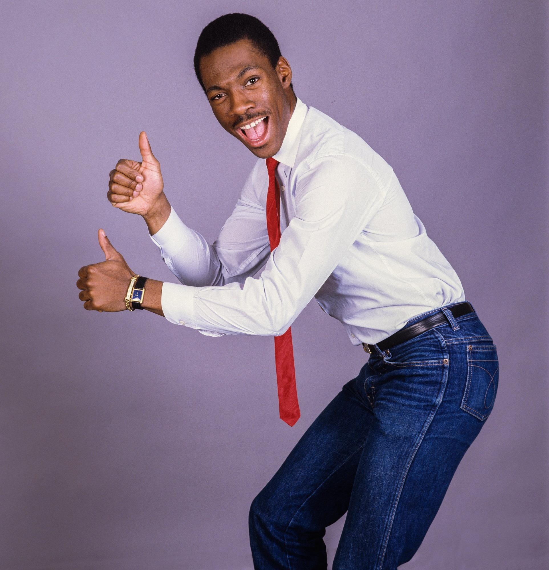 Eddie Murphy: A dominant comedic voice in the United States during the 1980s. 1930x2000 HD Background.