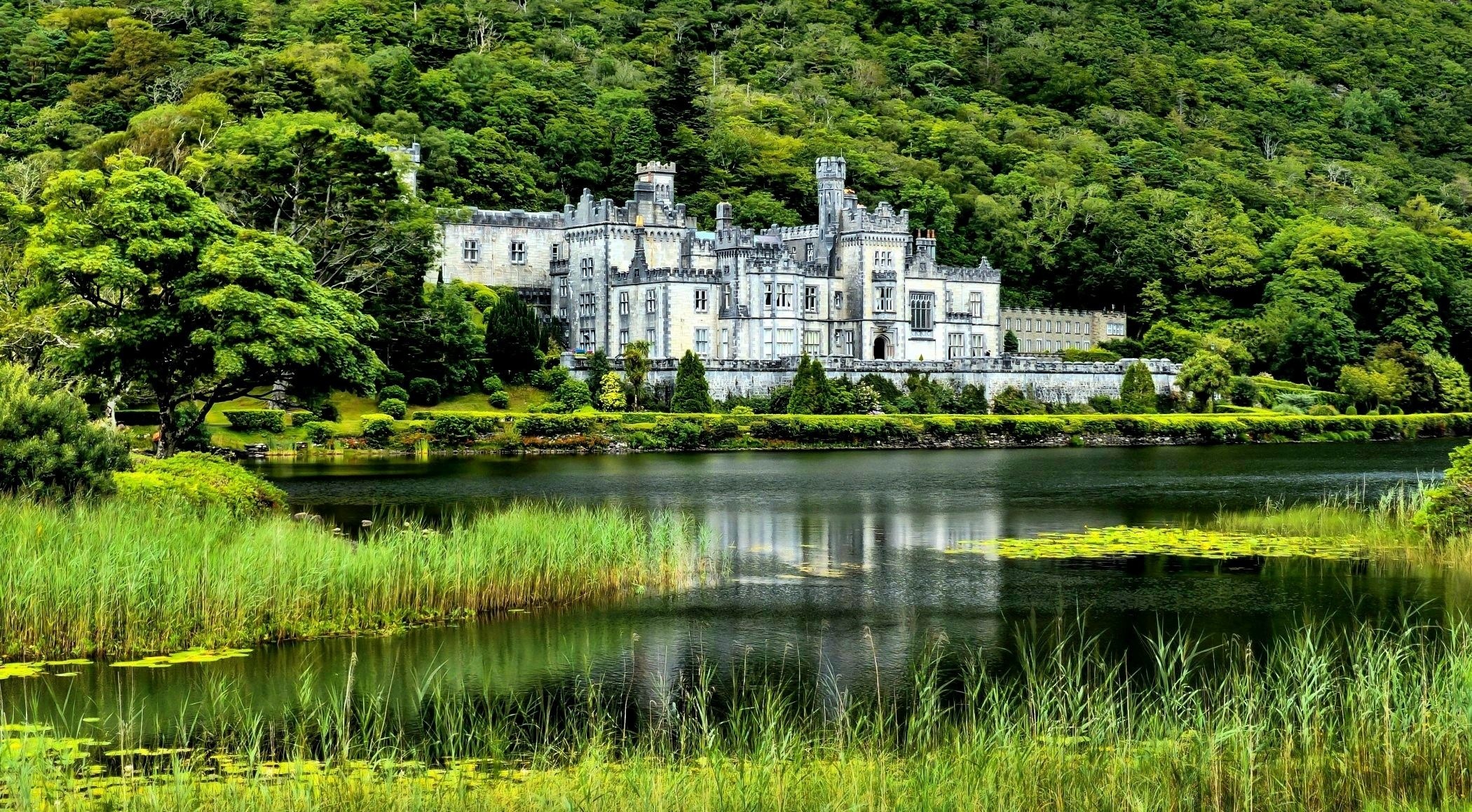 Irish Castle, Majestic architecture, Historic landmarks, Enchanting scenery, 2100x1160 HD Desktop