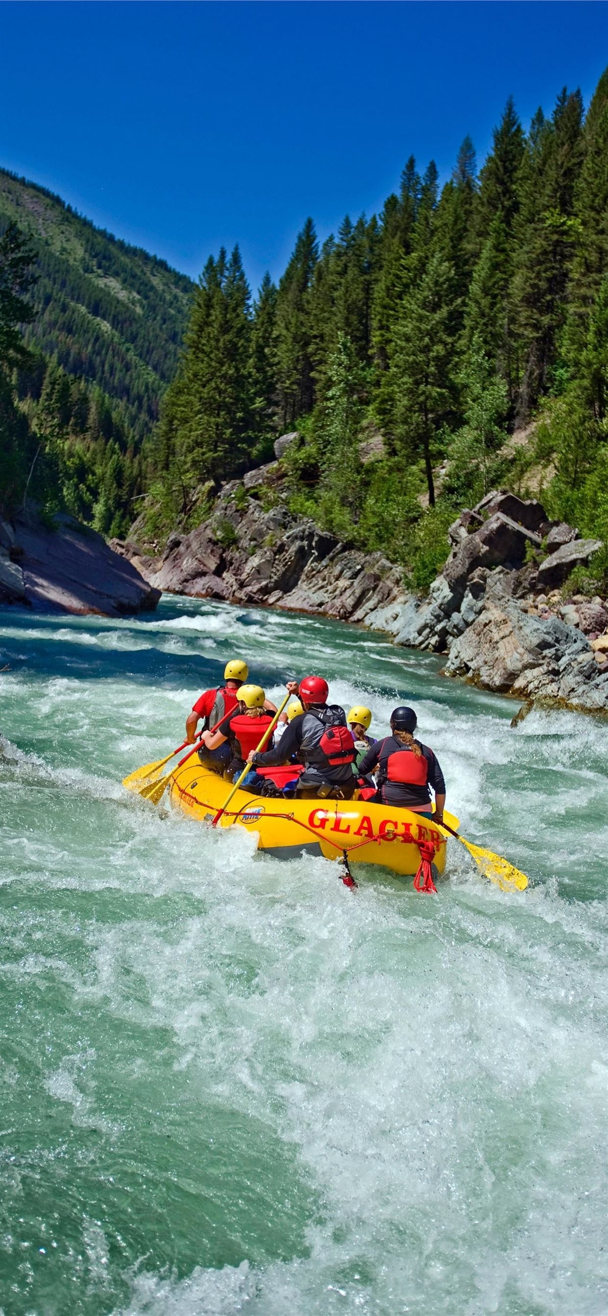 Rafting: Adventurous boating down an intense river in the mountains. 1250x2690 HD Wallpaper.