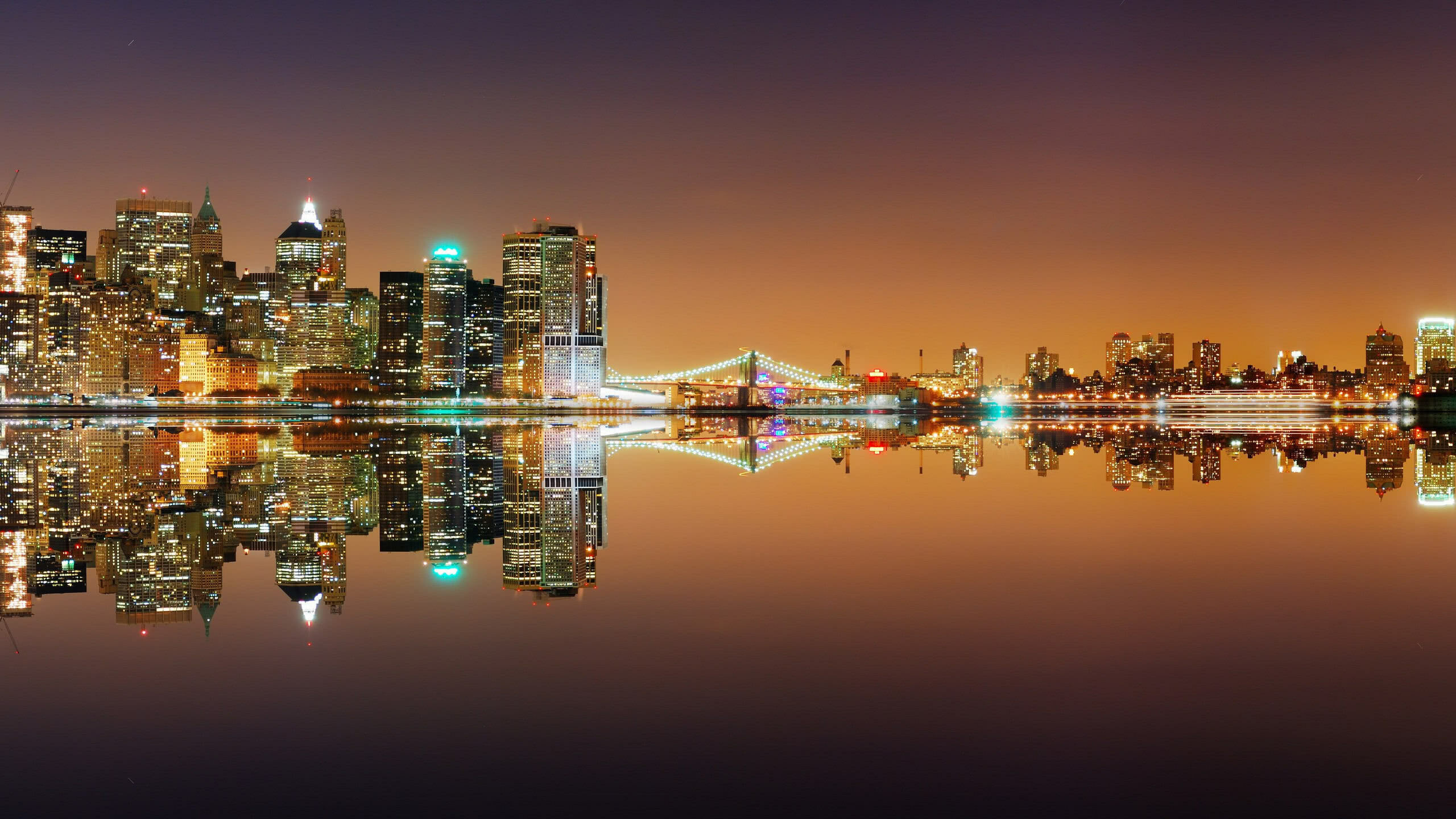 United States: New York skyline, Night city lights. 2560x1440 HD Background.