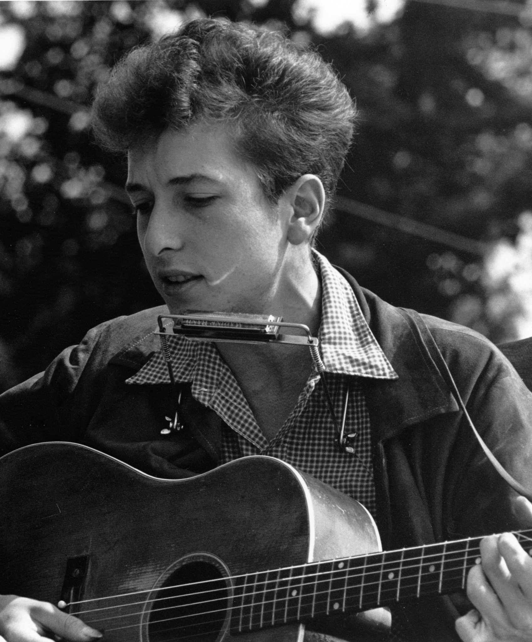 Bob Dylan: American folksinger who moved from folk to rock music in the 1960s. 1700x2050 HD Background.