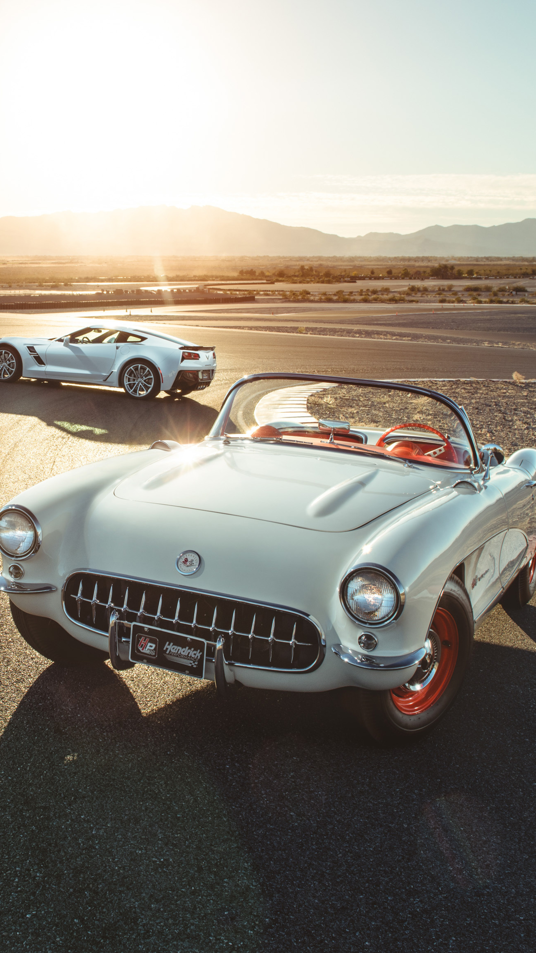 Corvette: A vintage model of 1953 near the latest ZR1 model of 2019, An American sports car with a long history. 2160x3840 4K Wallpaper.