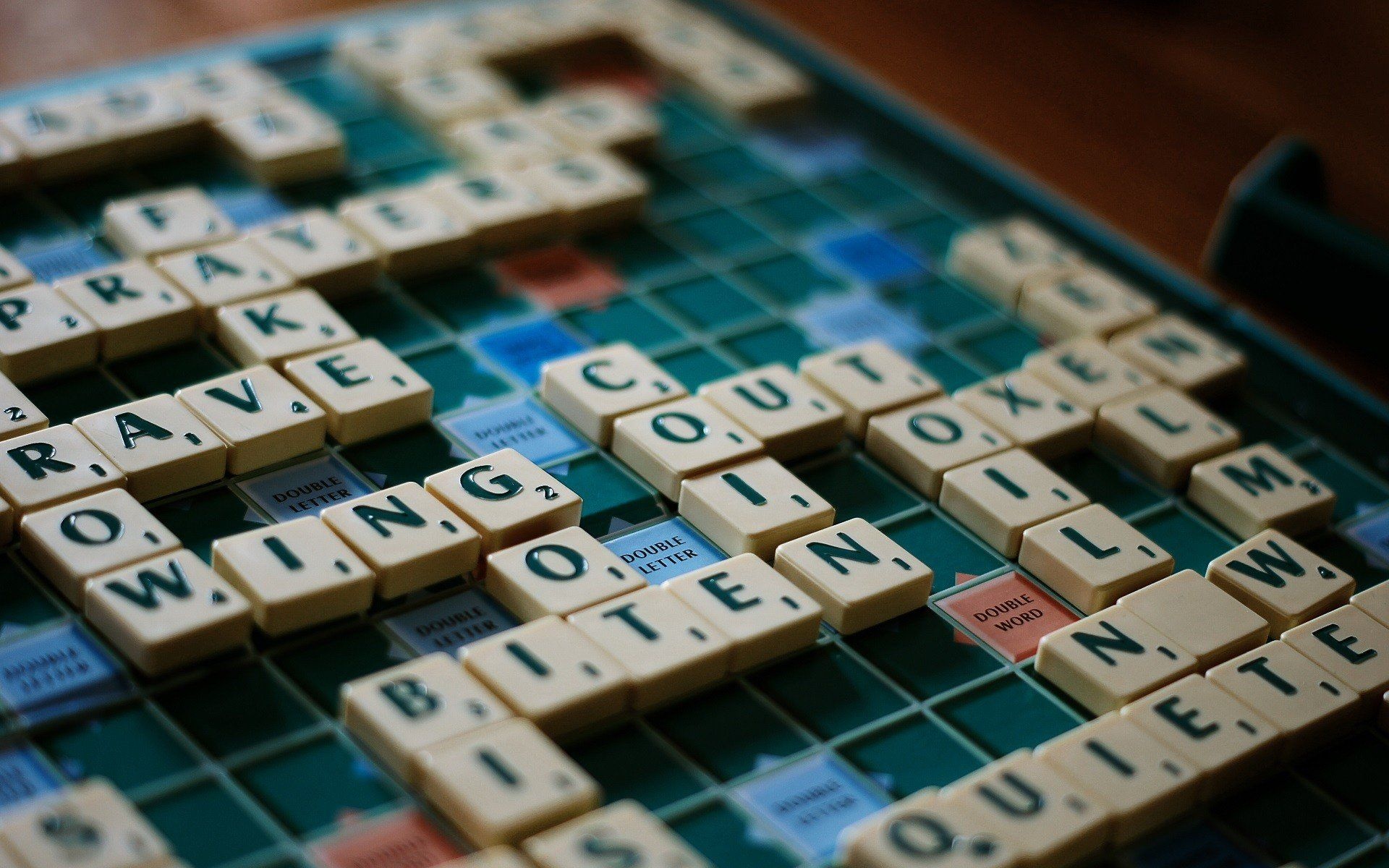 Scrabble: The crossword-style formation on the Mattel game board of an English edition. 1920x1200 HD Background.