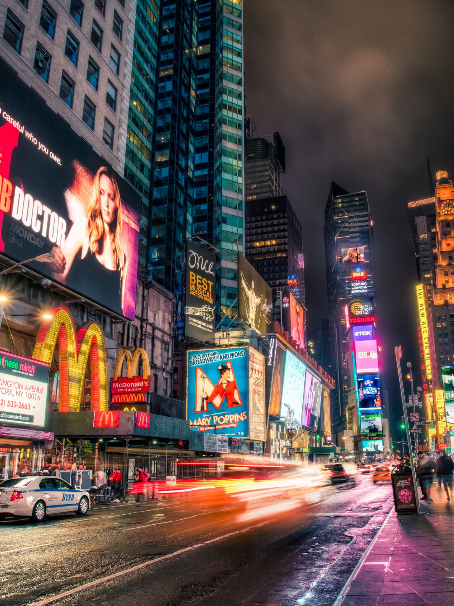 United States: New York City, Times Square, Midtown Manhattan, Neon. 1540x2050 HD Background.