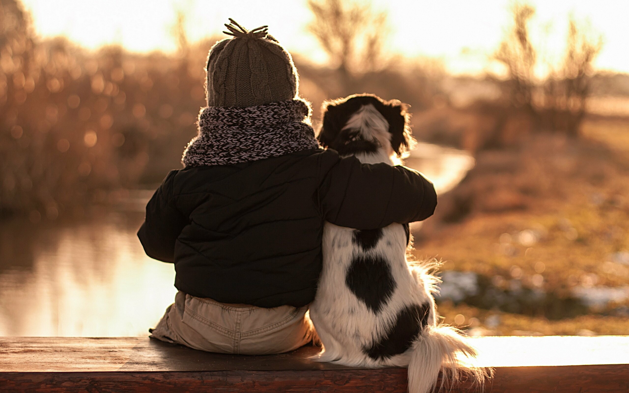 Child and dog hug, Innocence and friendship, Heartwarming moment, Joyful connection, 2560x1600 HD Desktop