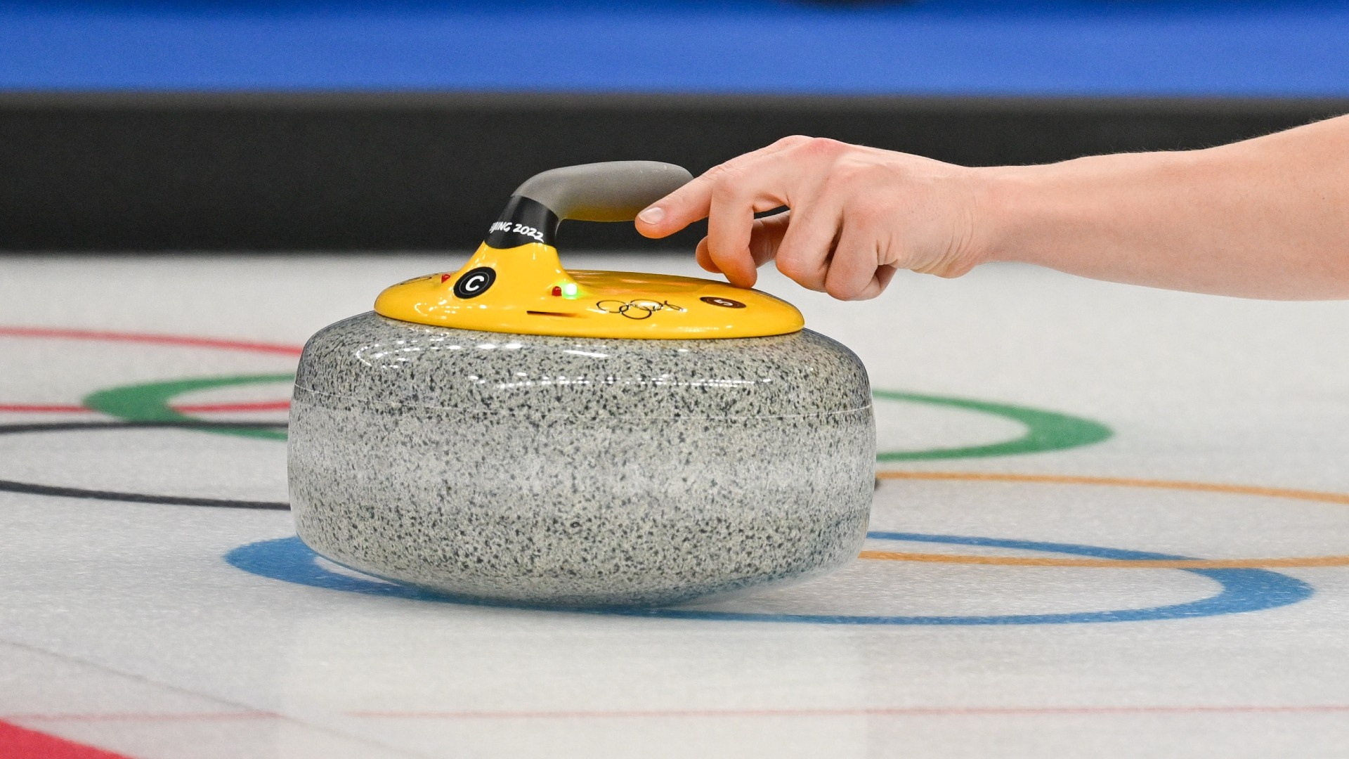 Curling: Sliding the rock at the Winter Olympic Games, A practice round. 1920x1080 Full HD Background.