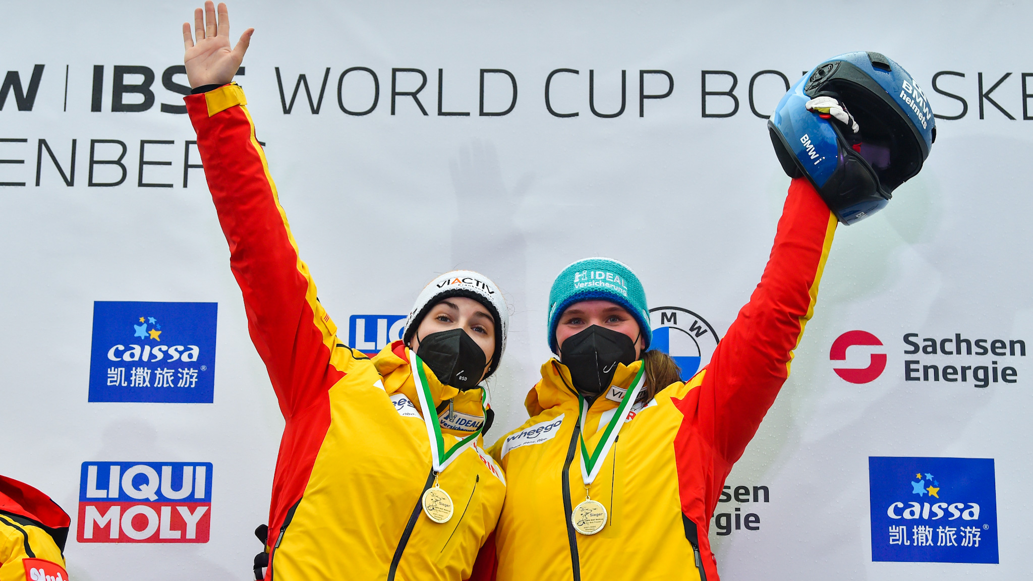 Skeleton (Sport): Kim Kalicki and Lisa Buckwitz from Germany celebrate after winning the podium, The IBSF World Cup. 2050x1160 HD Background.