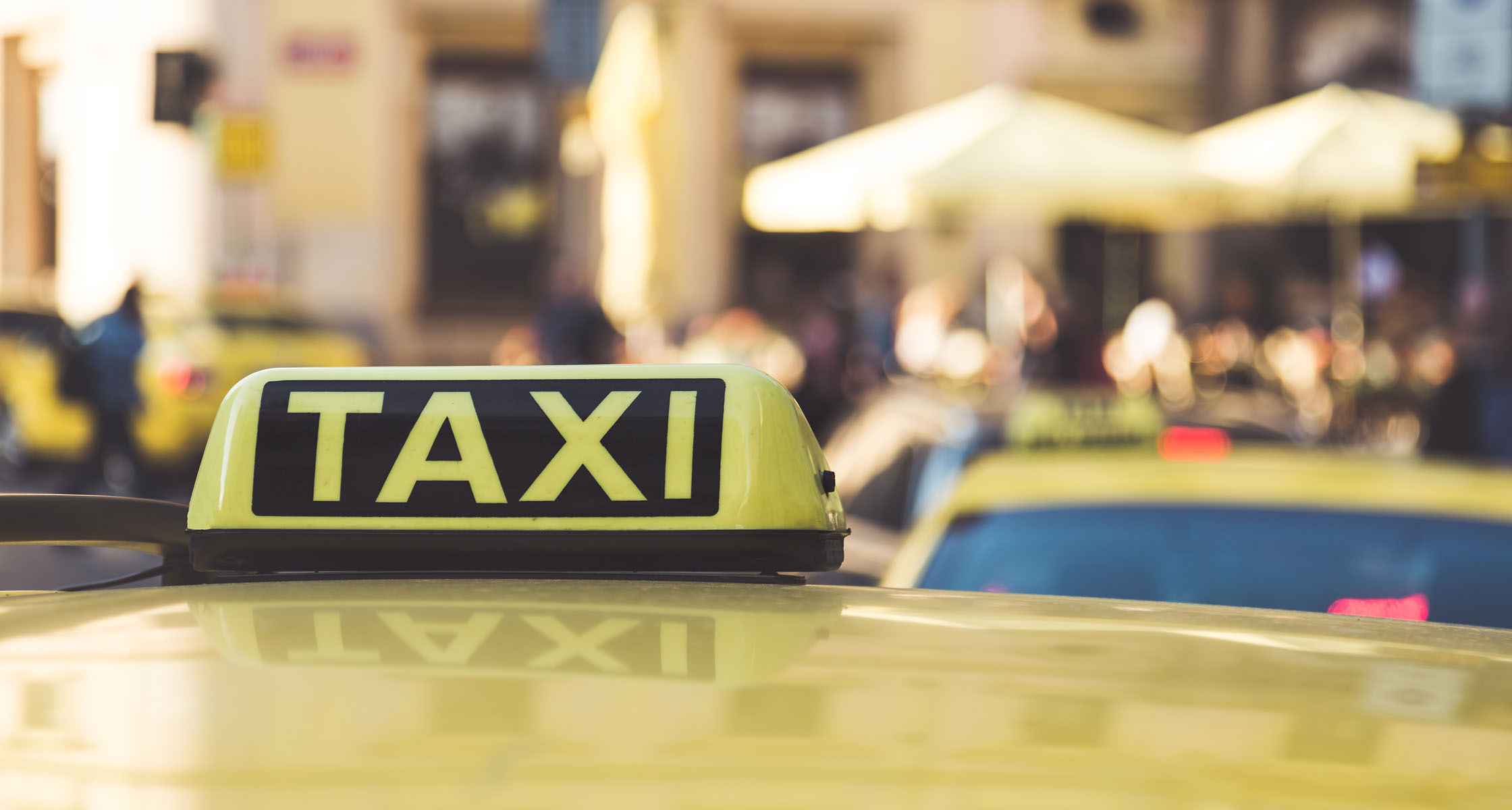 Taxi: A vehicle with a taximeter, A device for charging according to time and distance. 2240x1200 HD Background.