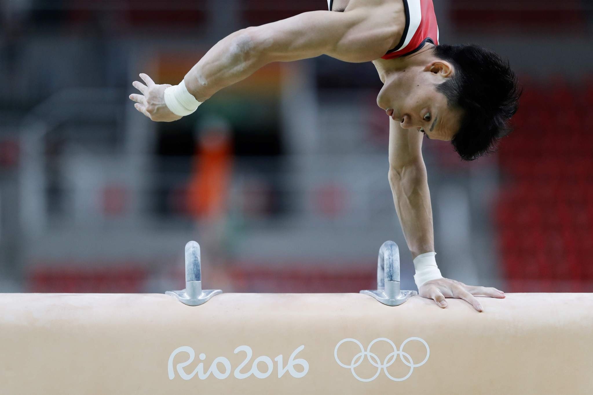 Pommel Horse (Gymnastics): Japanese gymnast, Olympic Arena, 2016, Handstand. 2050x1370 HD Background.