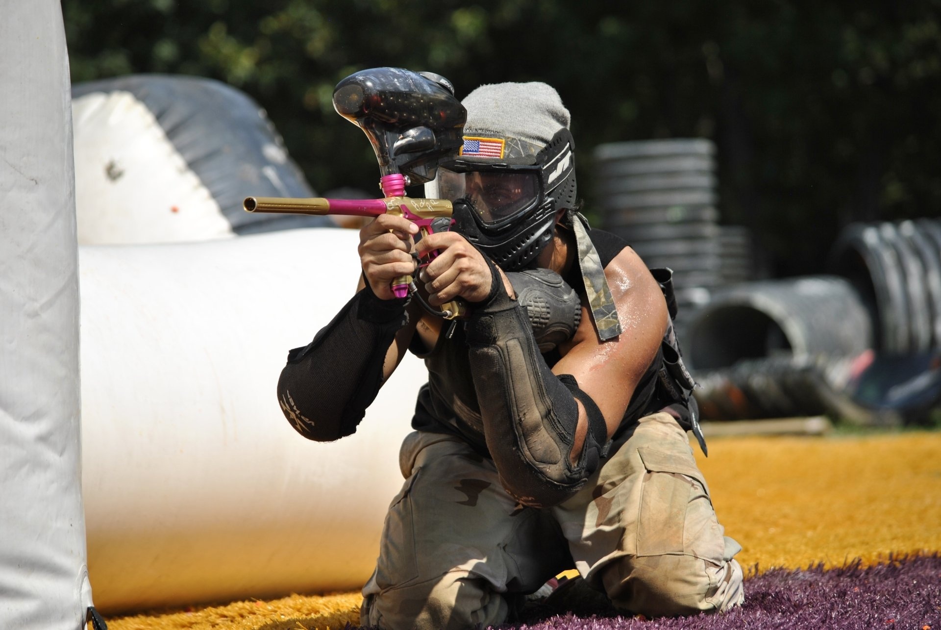 Paintball: The US team player shoots during the International Paint shooting Competition. 1920x1290 HD Background.