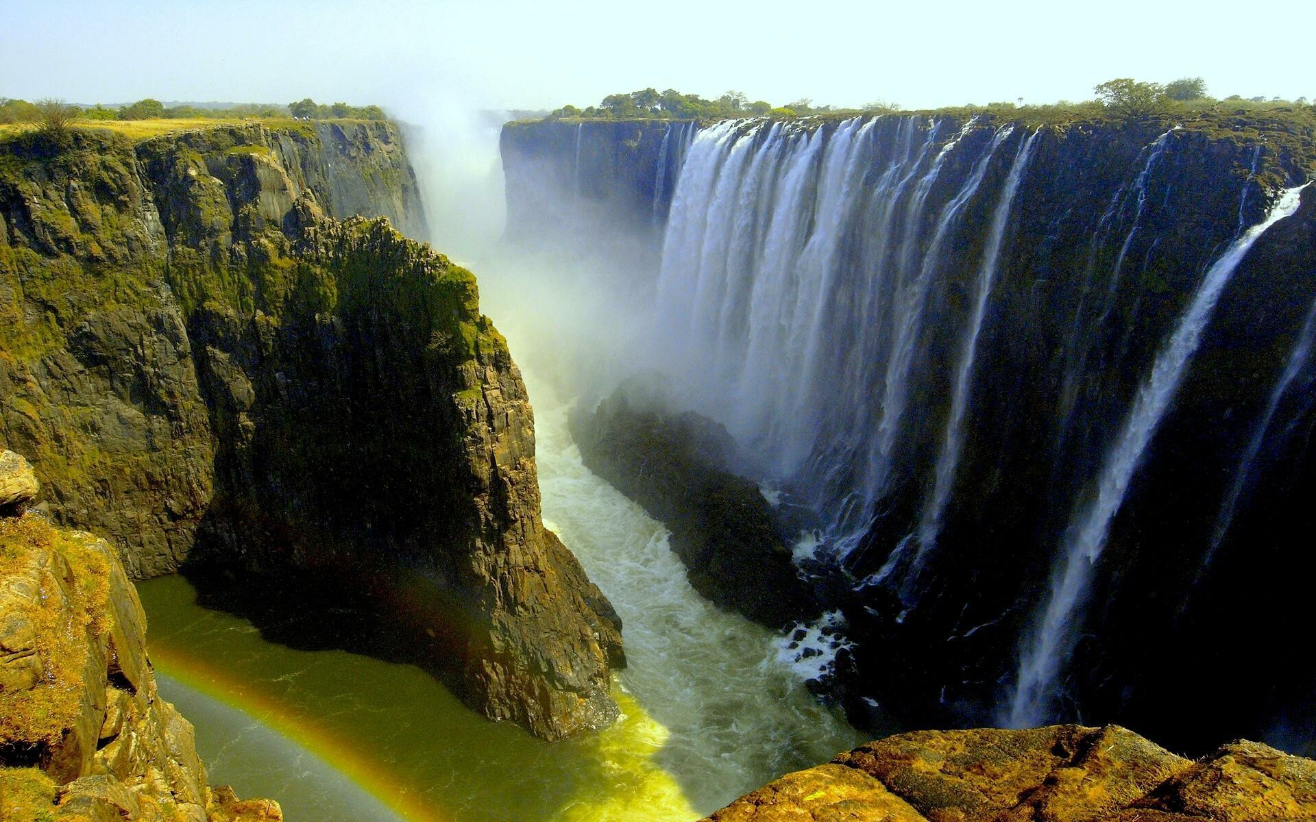 Victoria Falls: A curtain of water, Zambia, Zimbabwe, Fluvial landforms of streams. 1920x1200 HD Wallpaper.